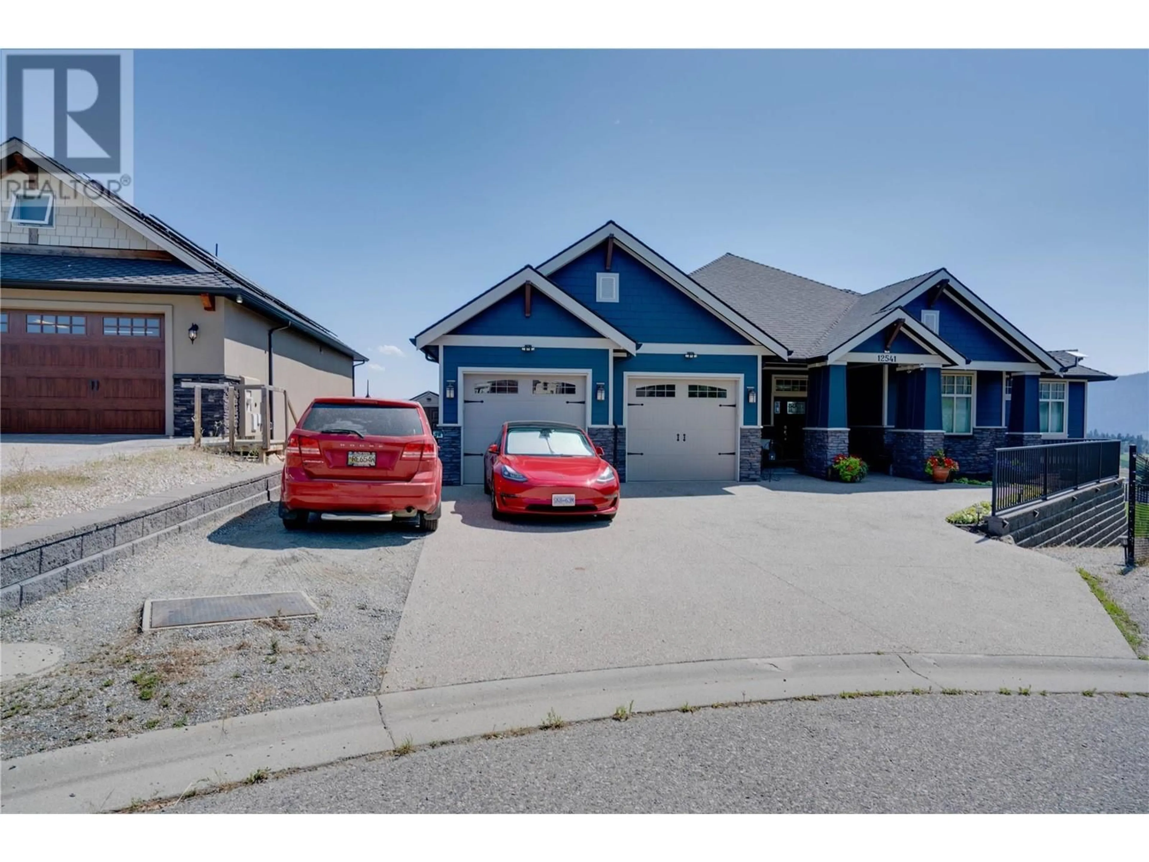 Frontside or backside of a home, the street view for 12541 Lake Vista Court, Lake Country British Columbia V4V2N1