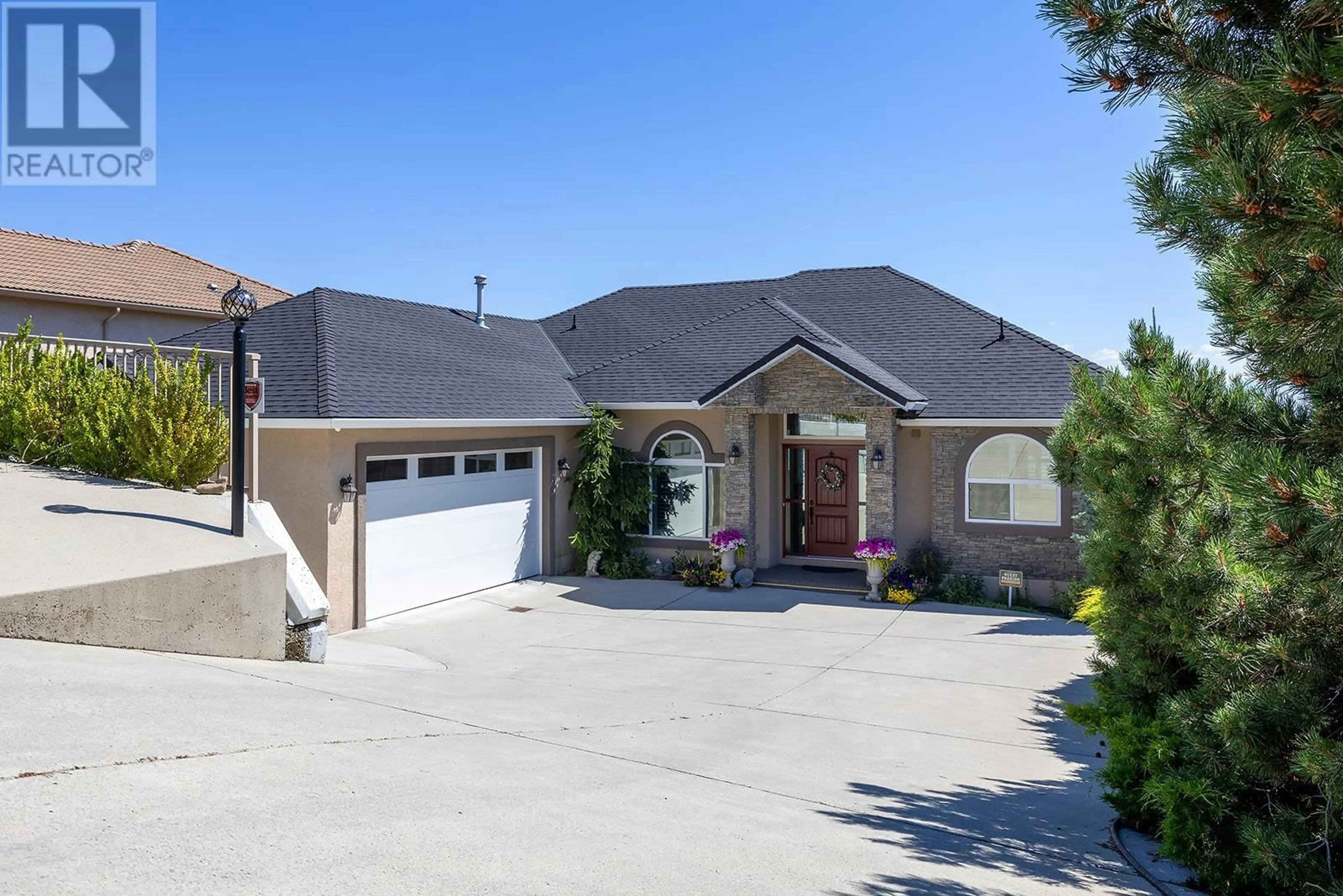 Frontside or backside of a home for 3576 Royal Gala Drive, West Kelowna British Columbia V4T2M4
