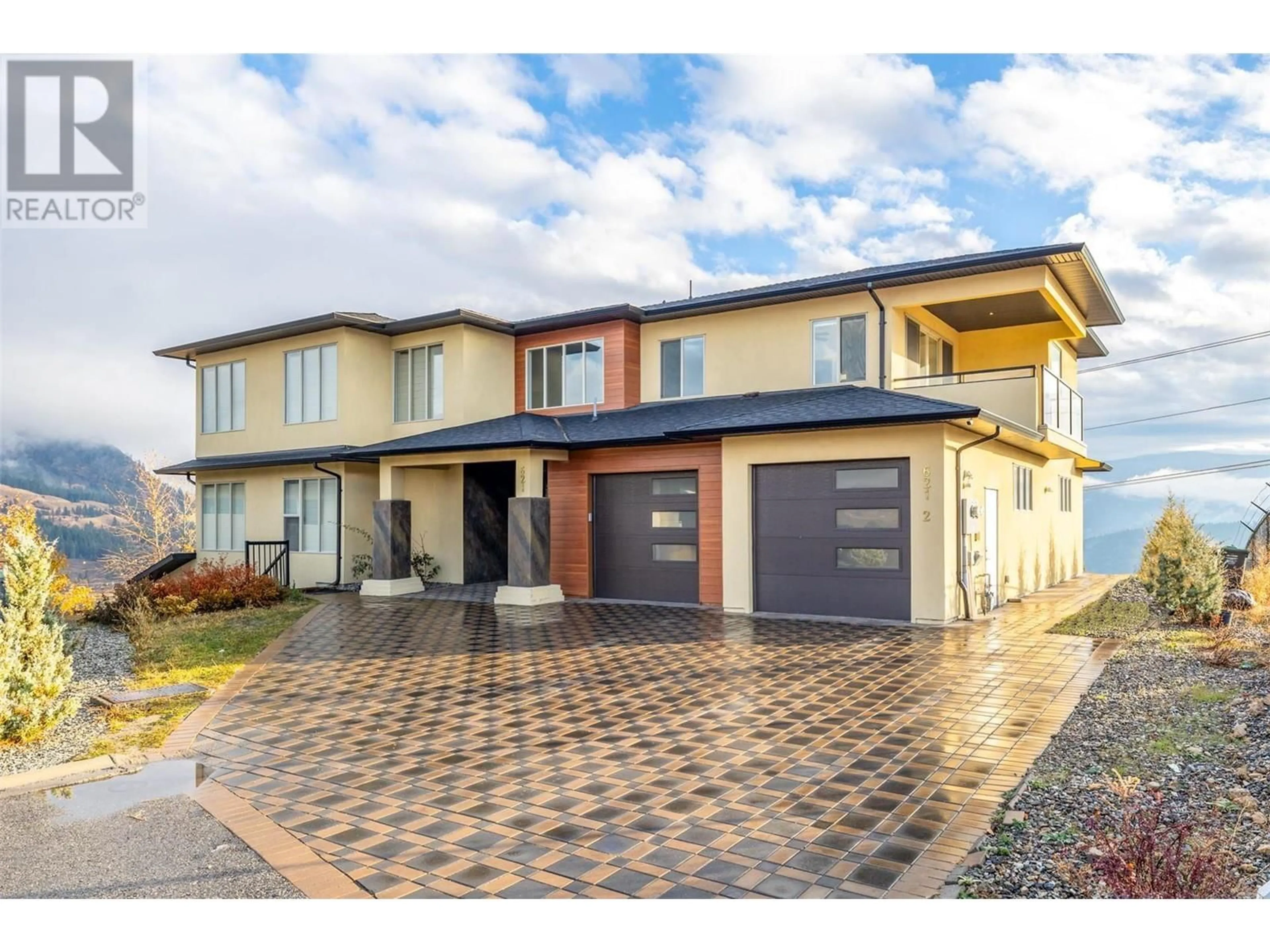 Frontside or backside of a home for 621 Barra Lane, Kelowna British Columbia V1P1T3