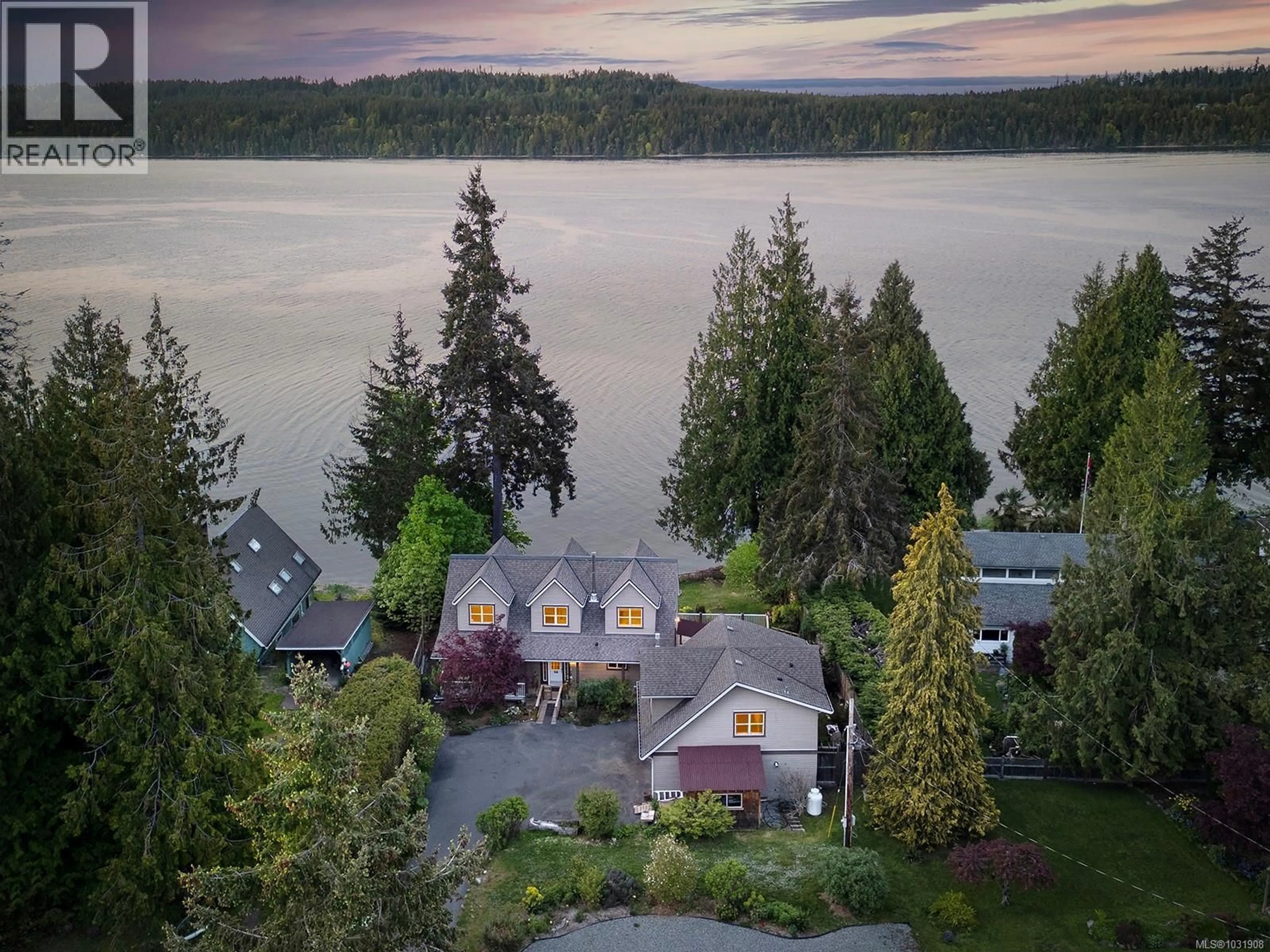 A pic from outside/outdoor area/front of a property/back of a property/a pic from drone, water/lake/river/ocean view for 7820 SHIPS POINT ROAD, Fanny Bay British Columbia V0R1W0