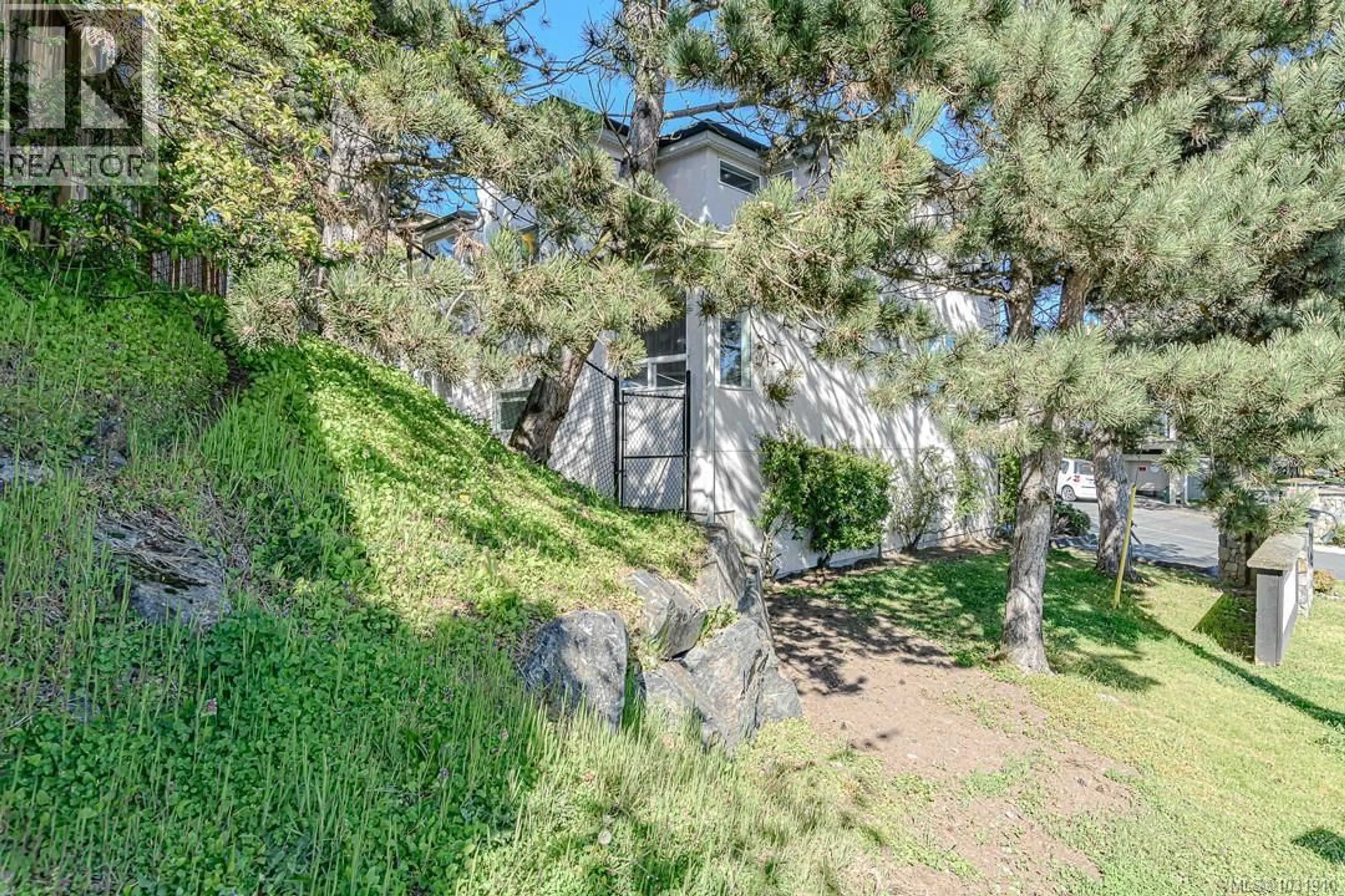 A pic from outside/outdoor area/front of a property/back of a property/a pic from drone, street for 1 - 300 SIX MILE ROAD, View Royal British Columbia V9B5Y3