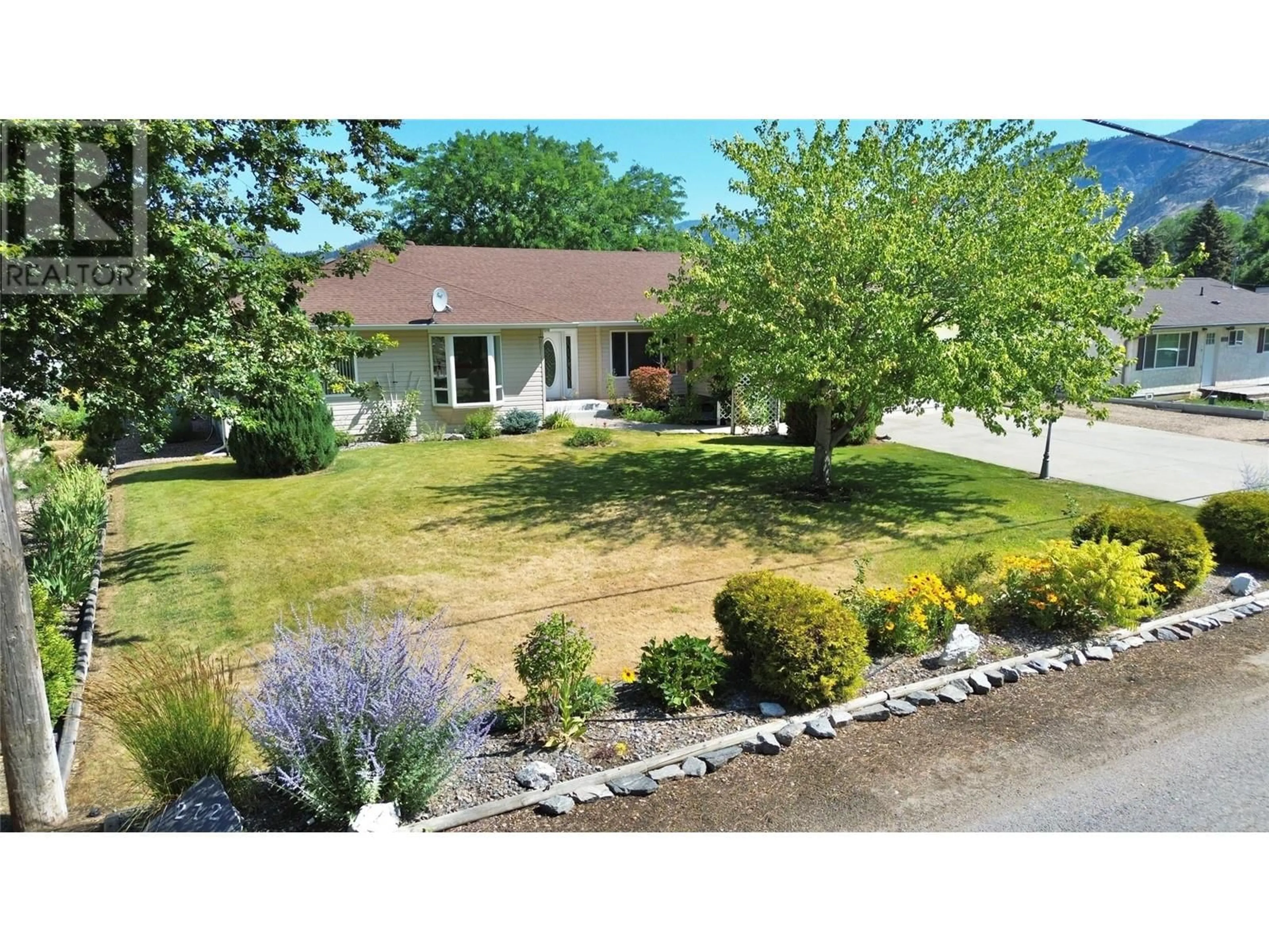 Frontside or backside of a home, the fenced backyard for 272 PARK RILL Road, Oliver British Columbia V0H1T7