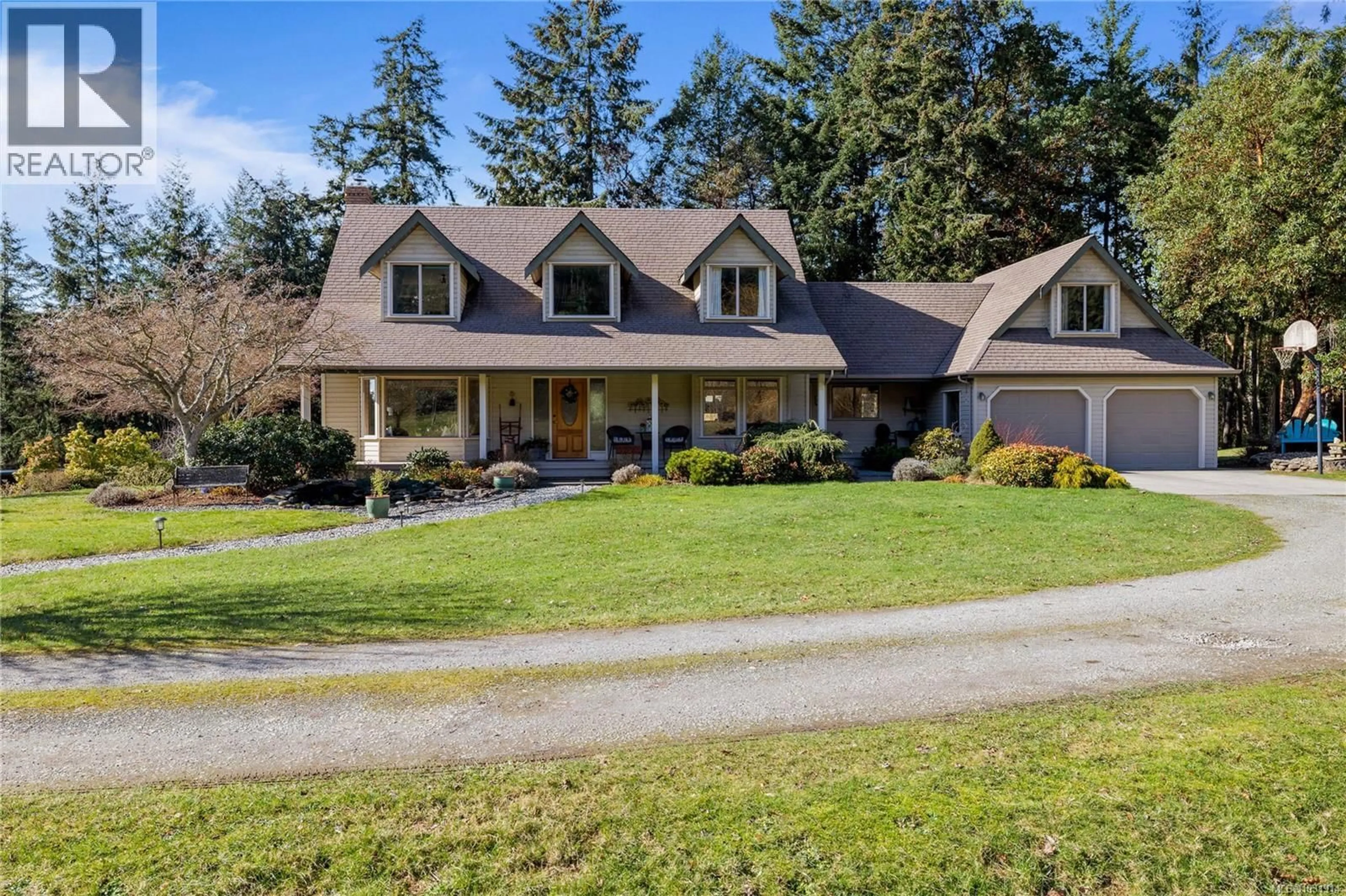 Home with vinyl exterior material, street for 877 SUNSET DRIVE, Salt Spring British Columbia V8K1E7