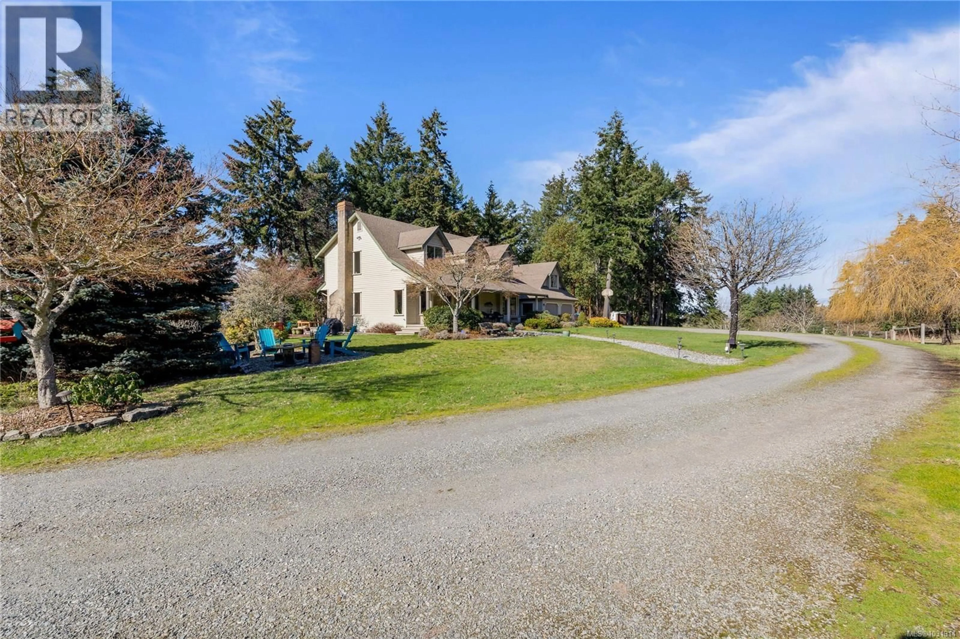 A pic from outside/outdoor area/front of a property/back of a property/a pic from drone, street for 877 SUNSET DRIVE, Salt Spring British Columbia V8K1E7