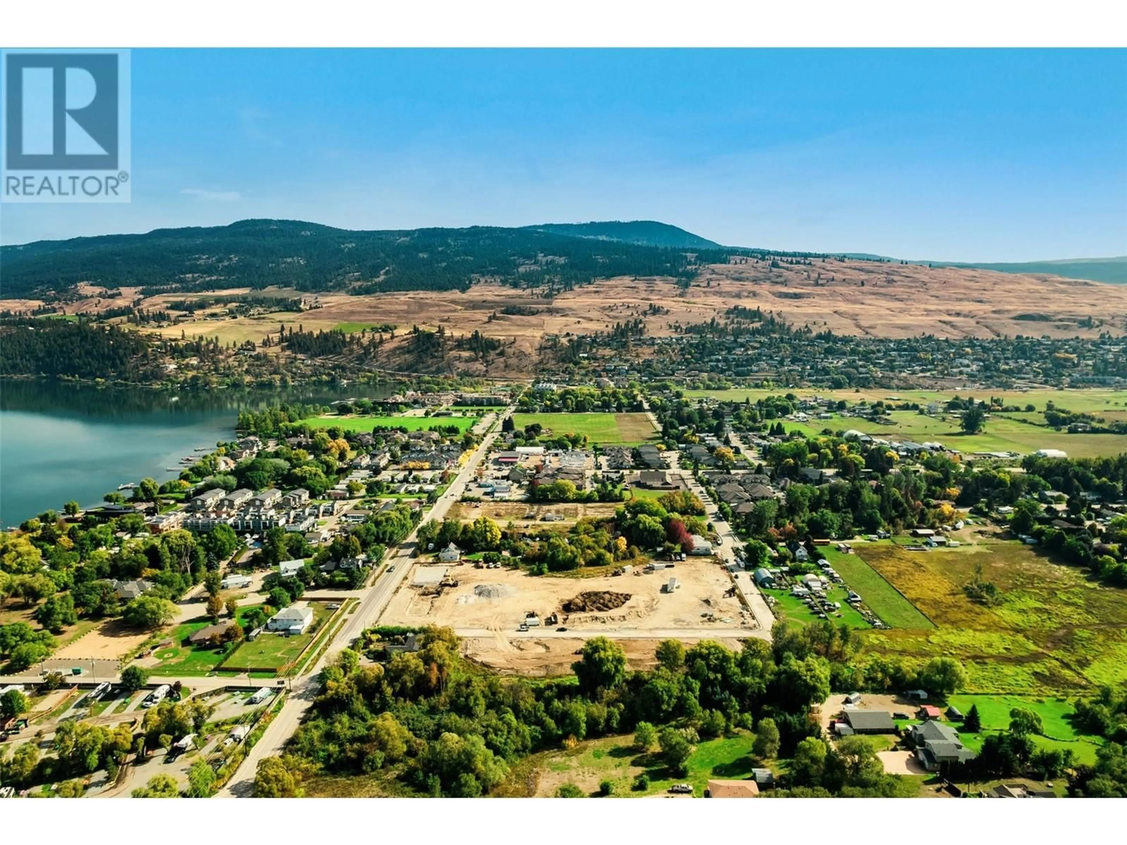 A pic from outside/outdoor area/front of a property/back of a property/a pic from drone, water/lake/river/ocean view for 16 - 11451 ETHERIDGE ROAD, Lake Country British Columbia V4V0C3