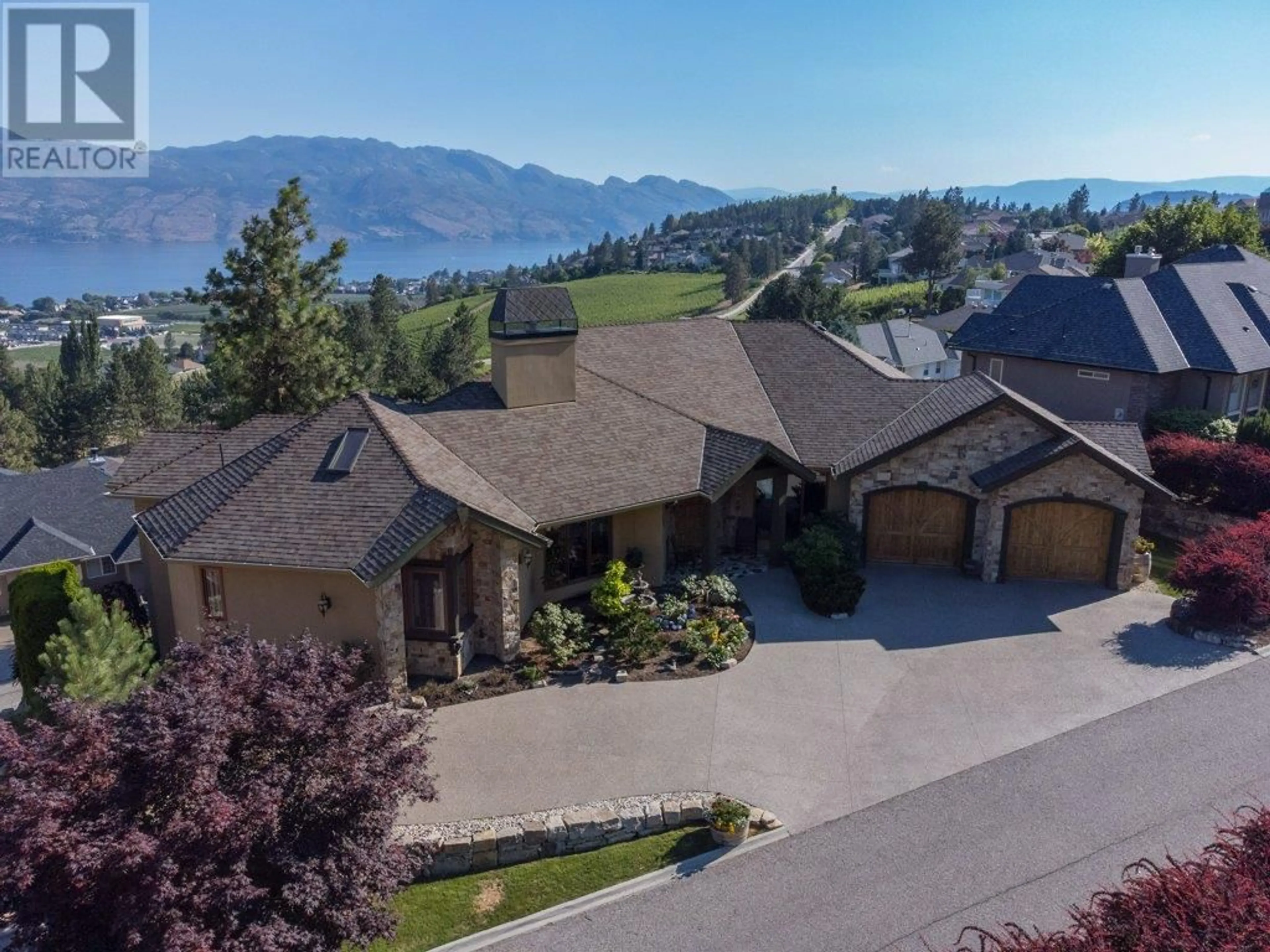 Frontside or backside of a home for 1555 Gregory Road, West Kelowna British Columbia V4T2V7