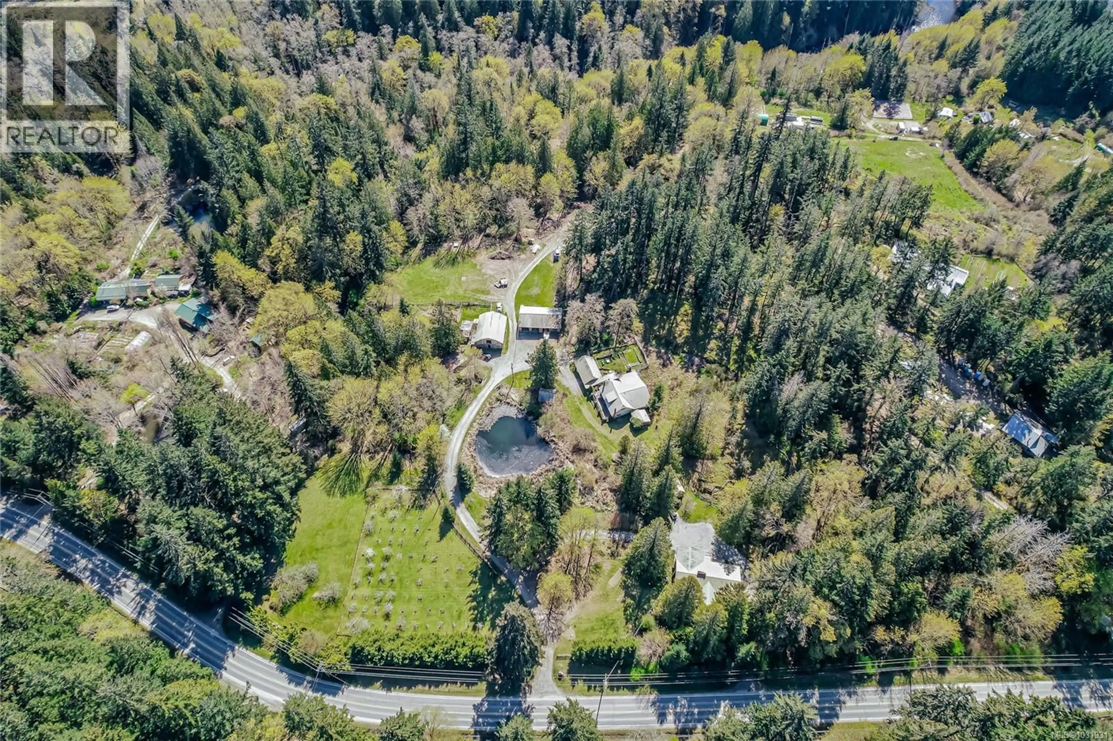 A pic from outside/outdoor area/front of a property/back of a property/a pic from drone, forest/trees view for 1671 FULFORD-GANGES ROAD, Salt Spring British Columbia V8K2A8