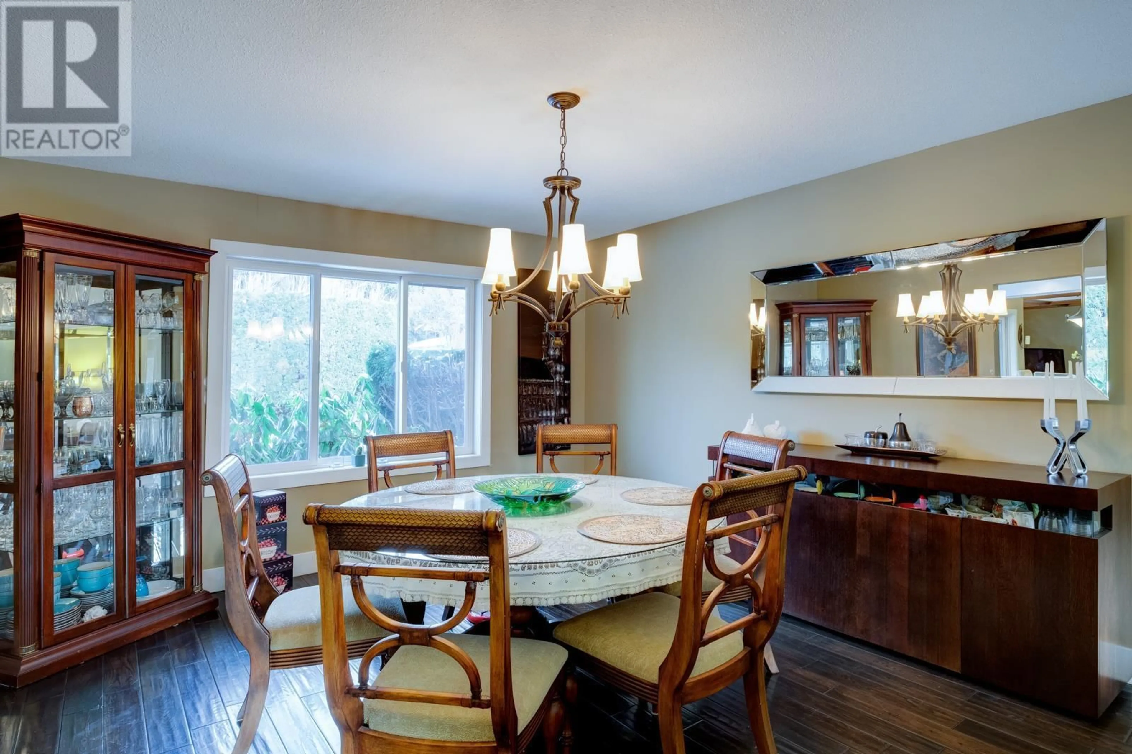 Dining room, wood floors, cottage for 1638 Pritchard Drive, West Kelowna British Columbia V4T1X3