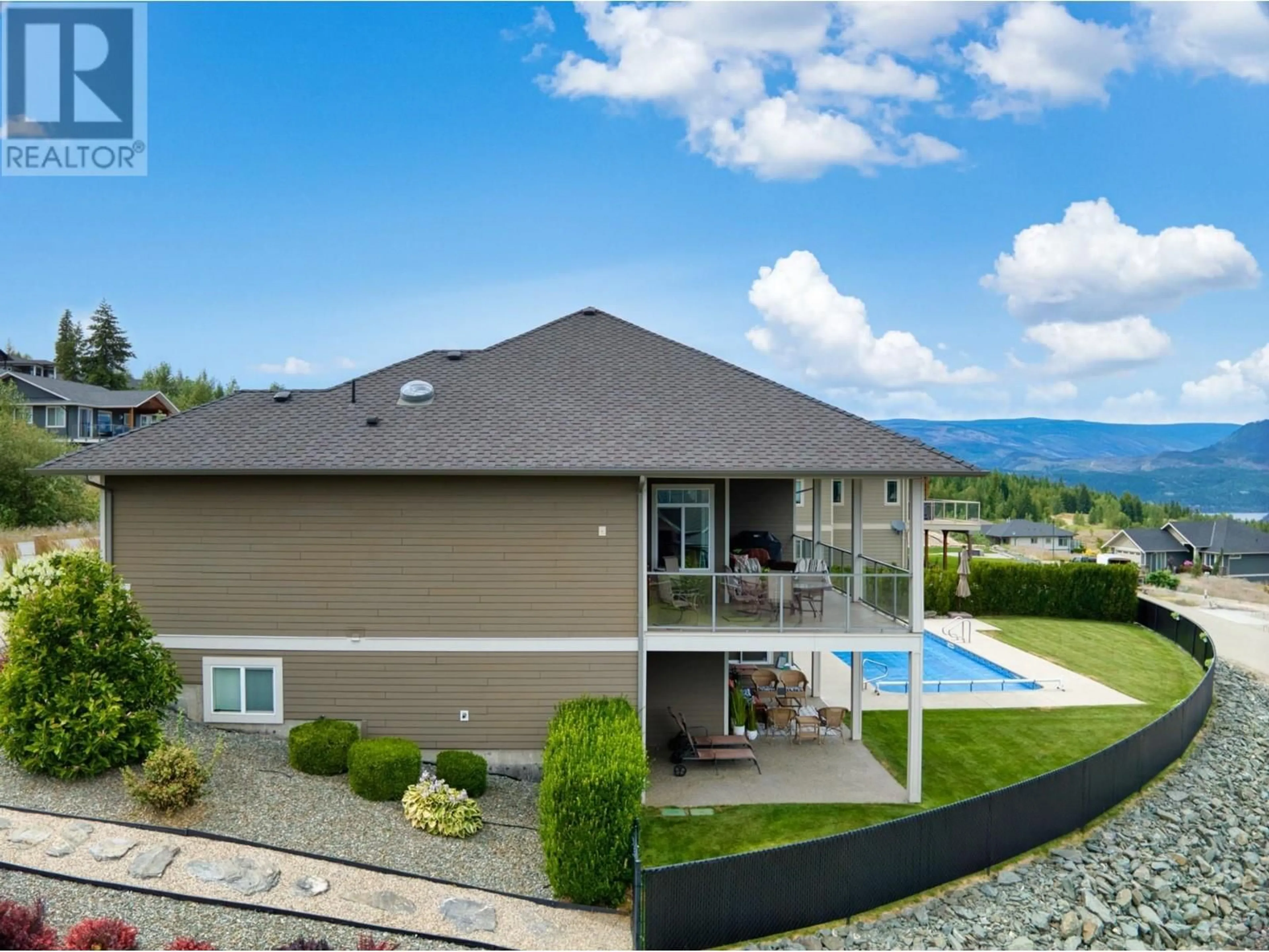 A pic from outside/outdoor area/front of a property/back of a property/a pic from drone, mountain view for 2582 St Andrews Street, Blind Bay British Columbia V0E1H0