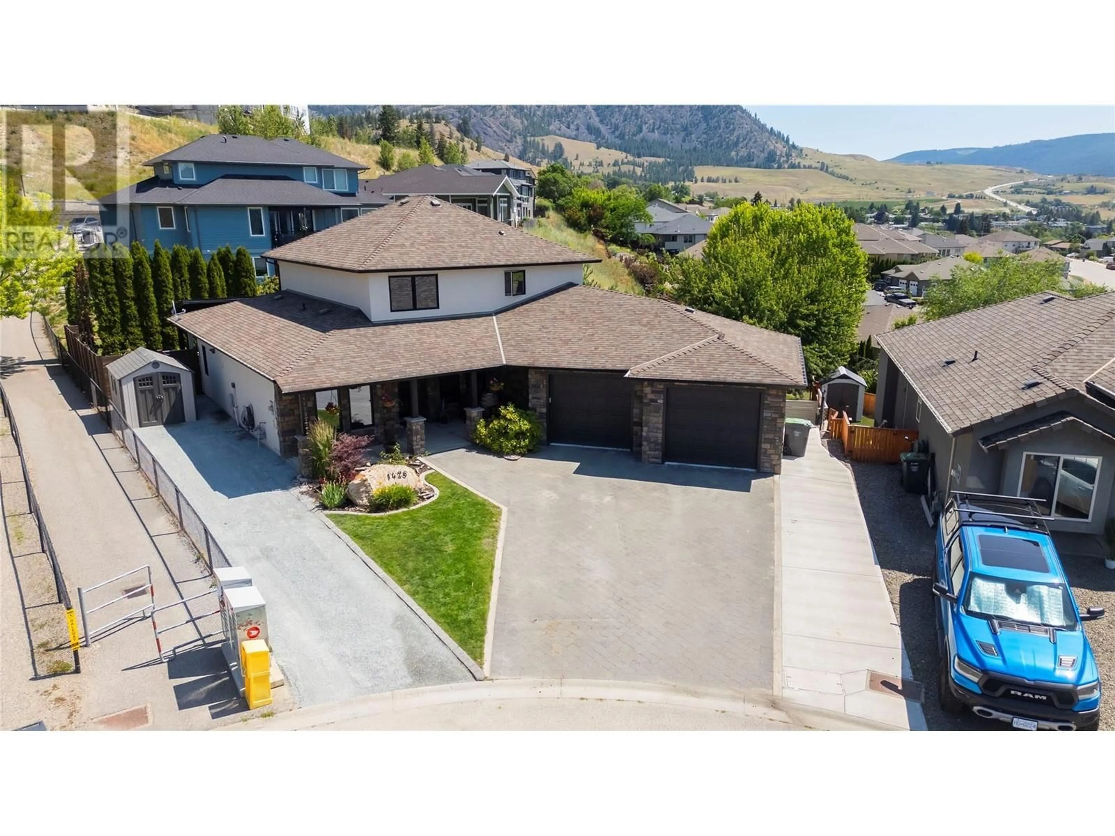 Frontside or backside of a home for 1428 Kendra Court, Kelowna British Columbia V1P1P1