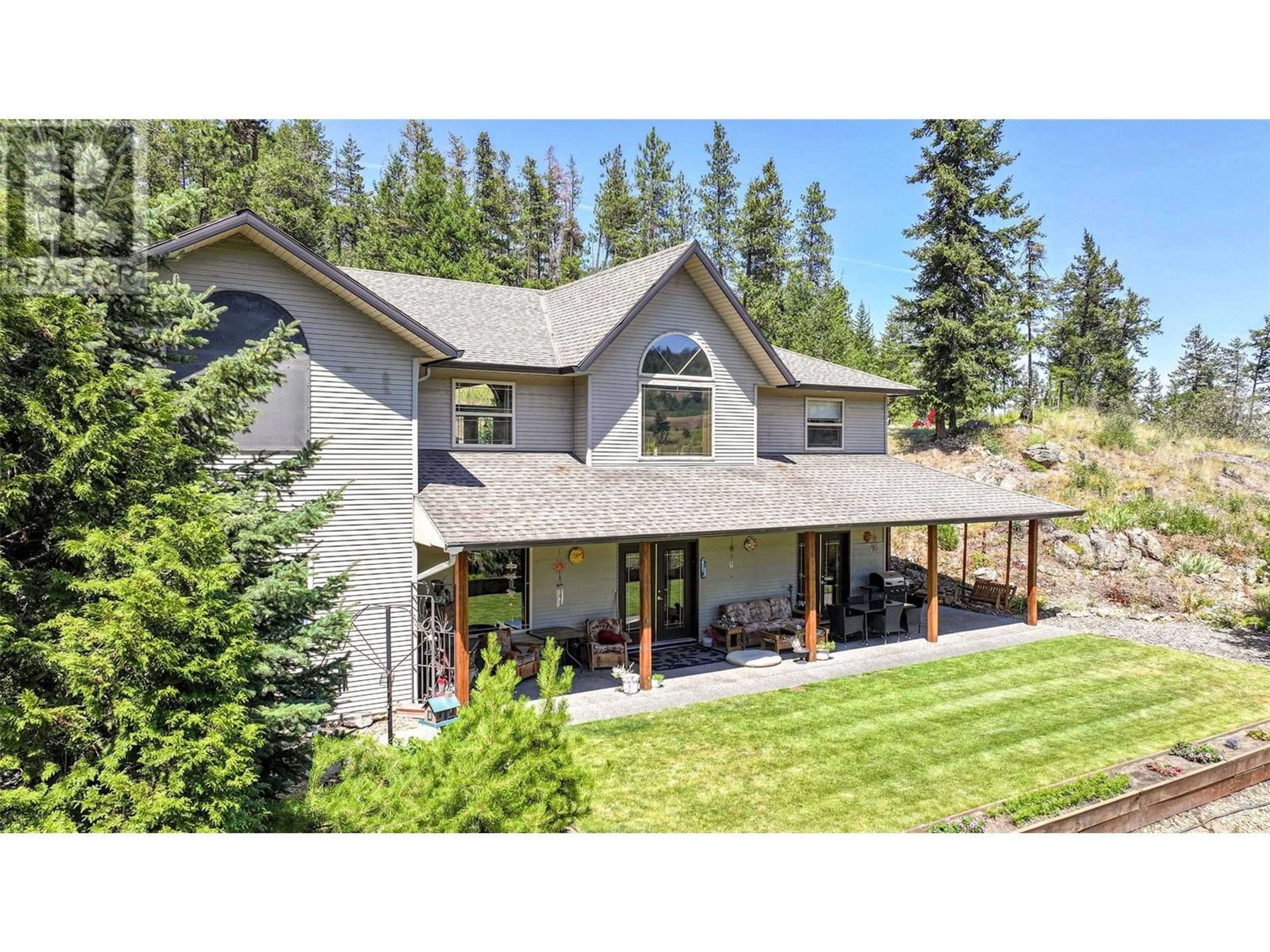 Frontside or backside of a home for 242 Commonage Road, Vernon British Columbia V1H1G4