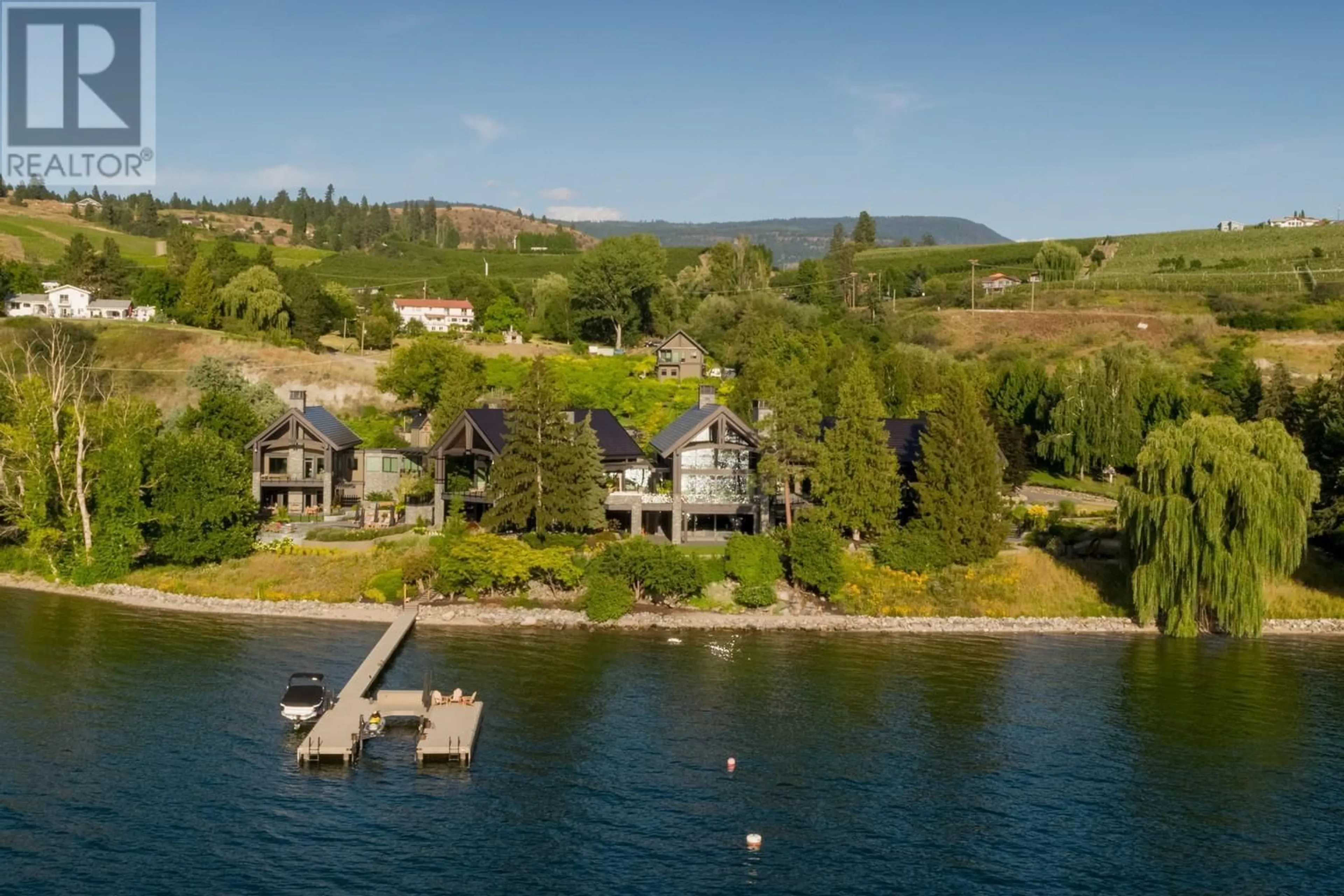 A pic from outside/outdoor area/front of a property/back of a property/a pic from drone, water/lake/river/ocean view for 12391 PIXTON ROAD, Lake Country British Columbia V4V1A1