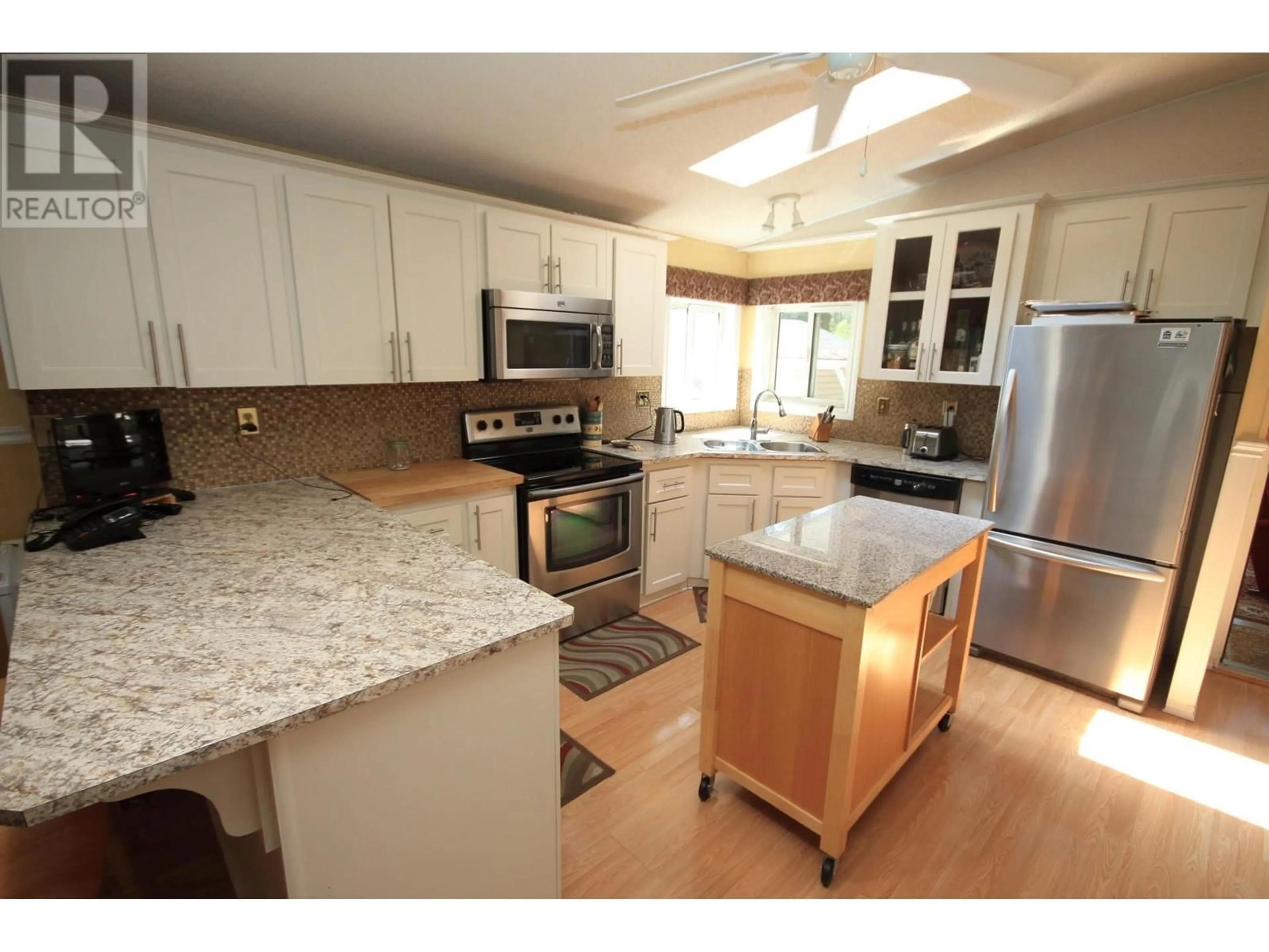 Open concept kitchen for 8487 HWY 97 Unit# 122, Oliver British Columbia V0H1T2