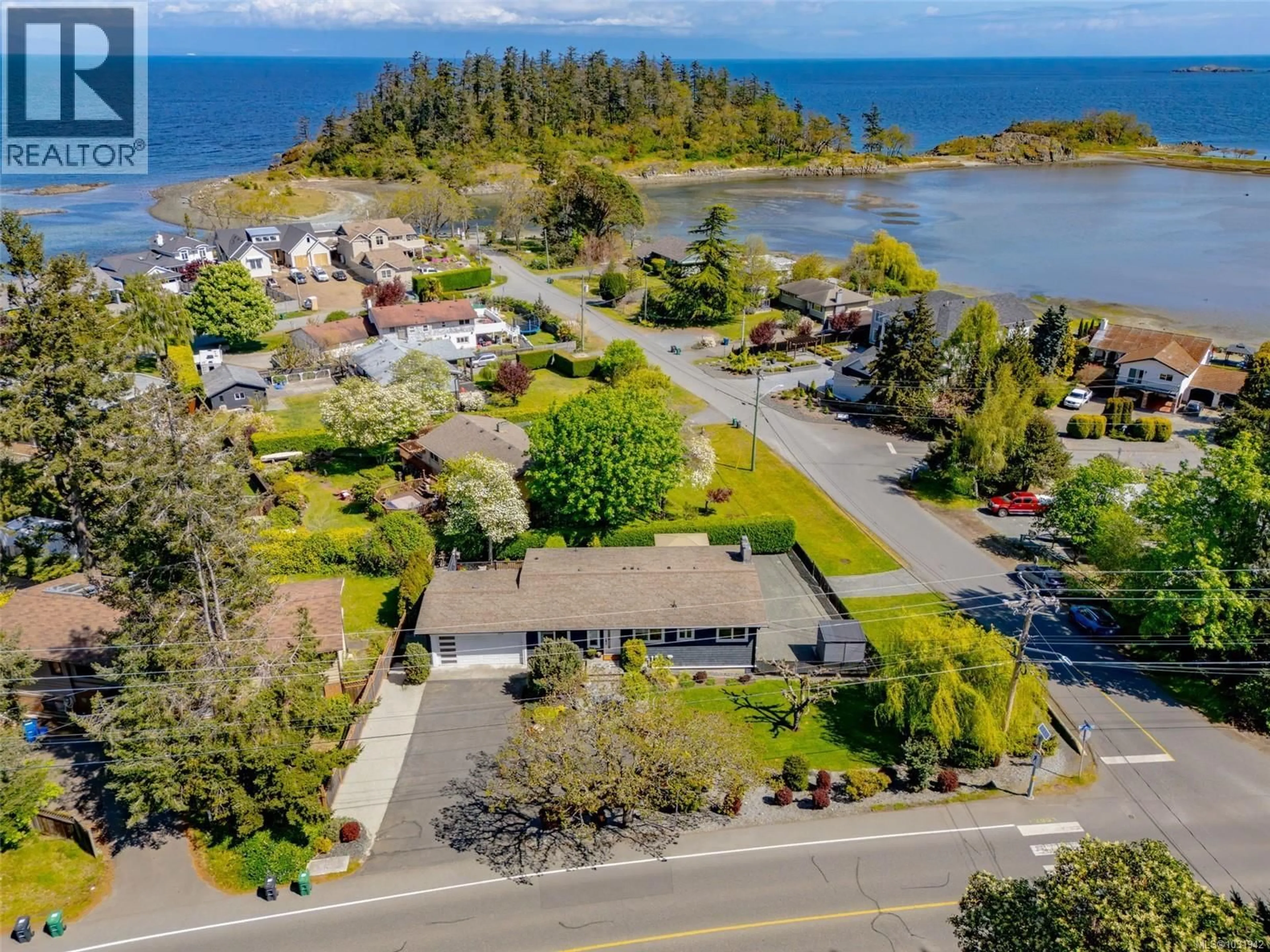 A pic from outside/outdoor area/front of a property/back of a property/a pic from drone, water/lake/river/ocean view for 3710 HAMMOND BAY ROAD, Nanaimo British Columbia V9T1G1