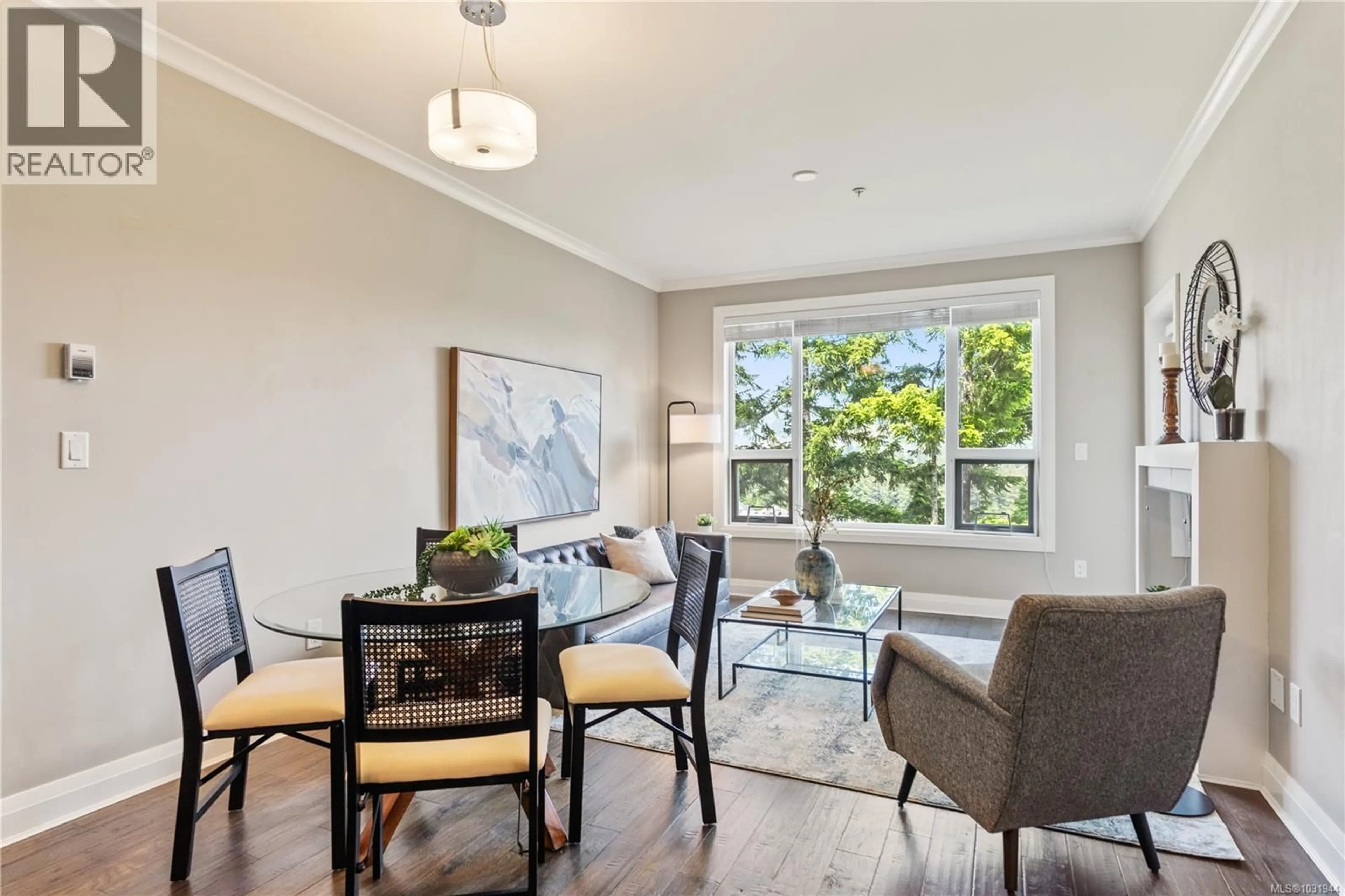 Living room with furniture, wood/laminate floor for 101 - 1145 SIKORSKY ROAD, Langford British Columbia V9B0M8
