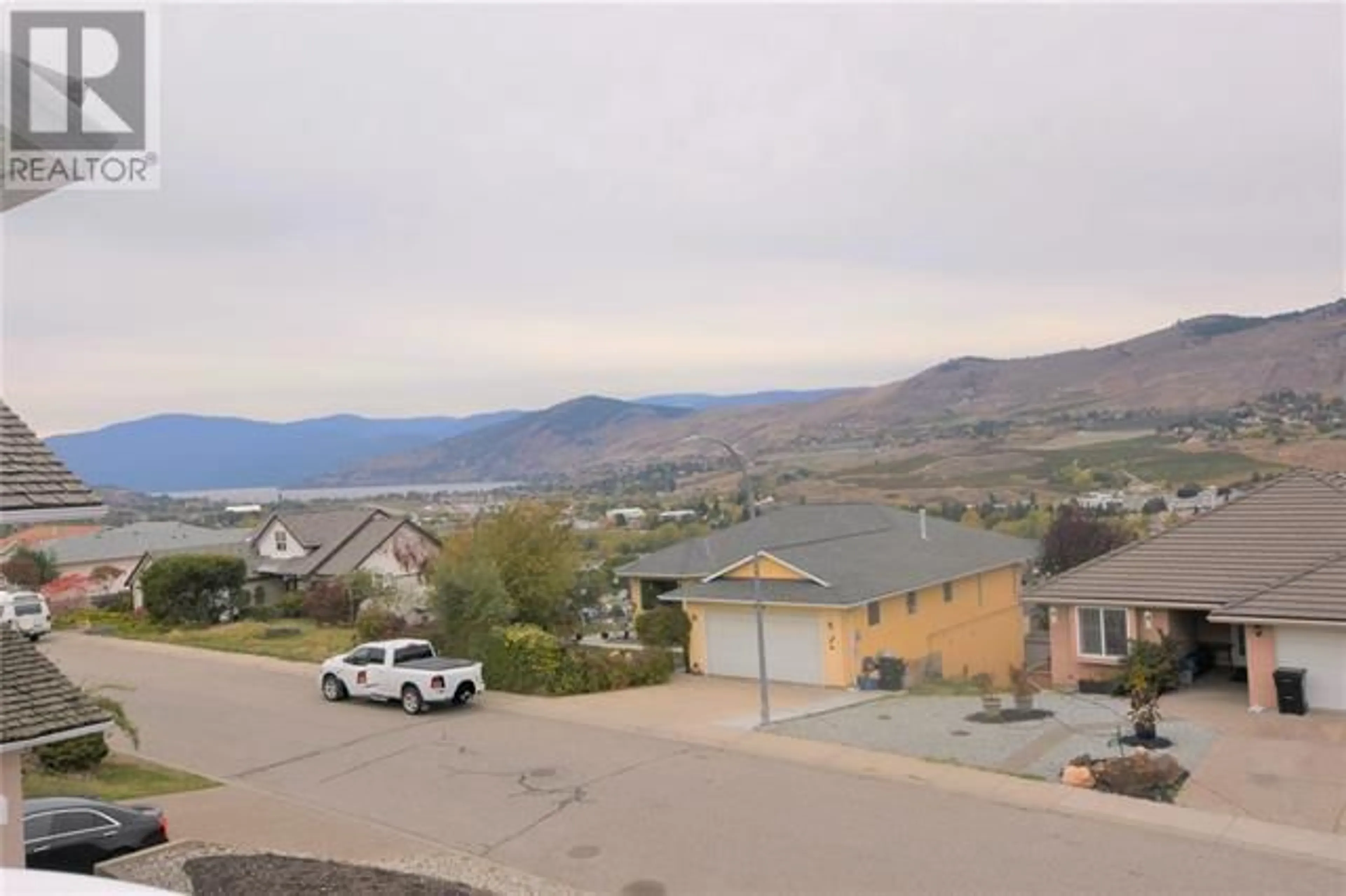 A pic from outside/outdoor area/front of a property/back of a property/a pic from drone, mountain view for 4904 VALLEYVIEW PLACE, Vernon British Columbia V1T9L6