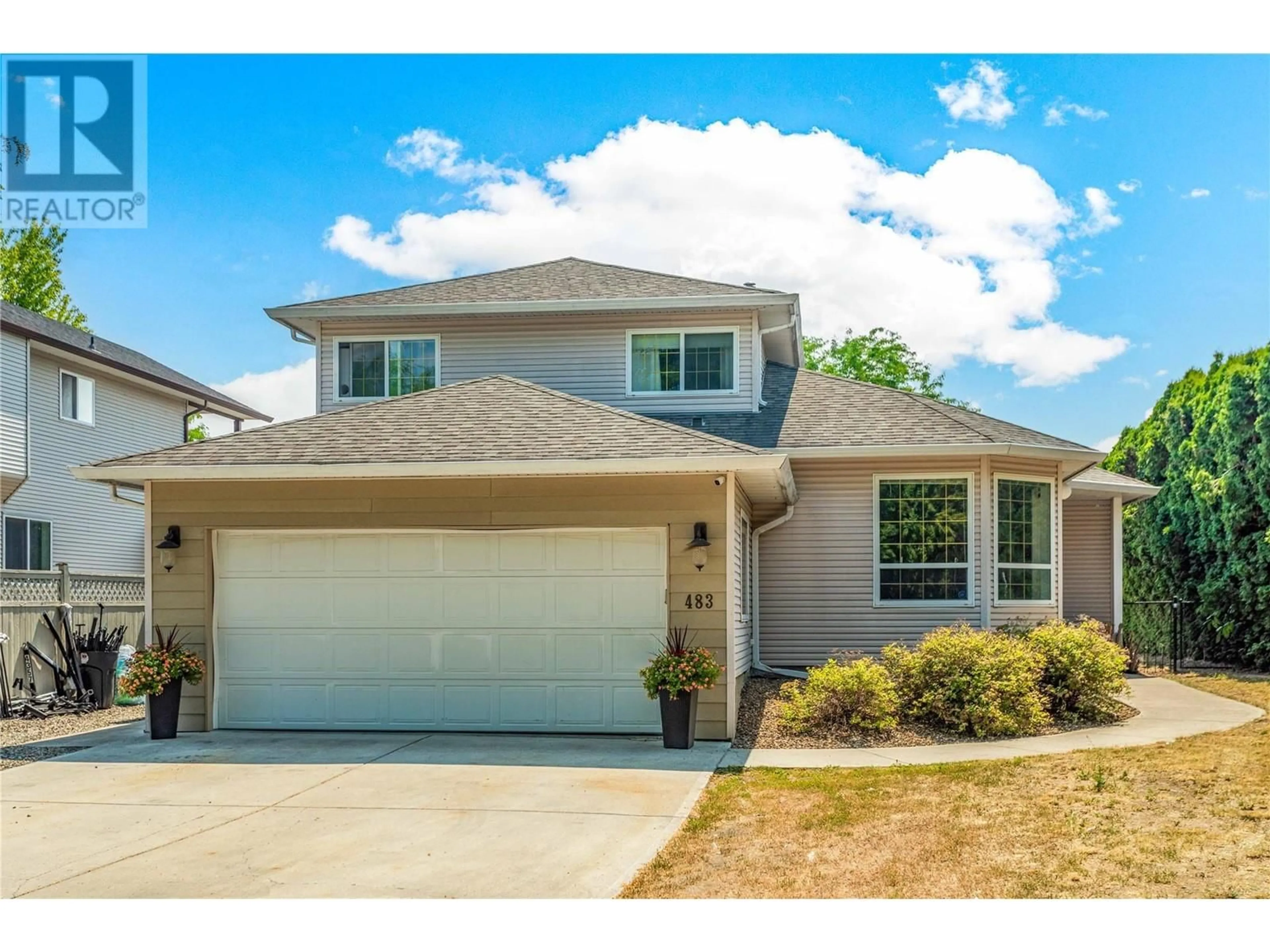 Frontside or backside of a home, the street view for 483 Parfitt Court, Kelowna British Columbia V1X7M9