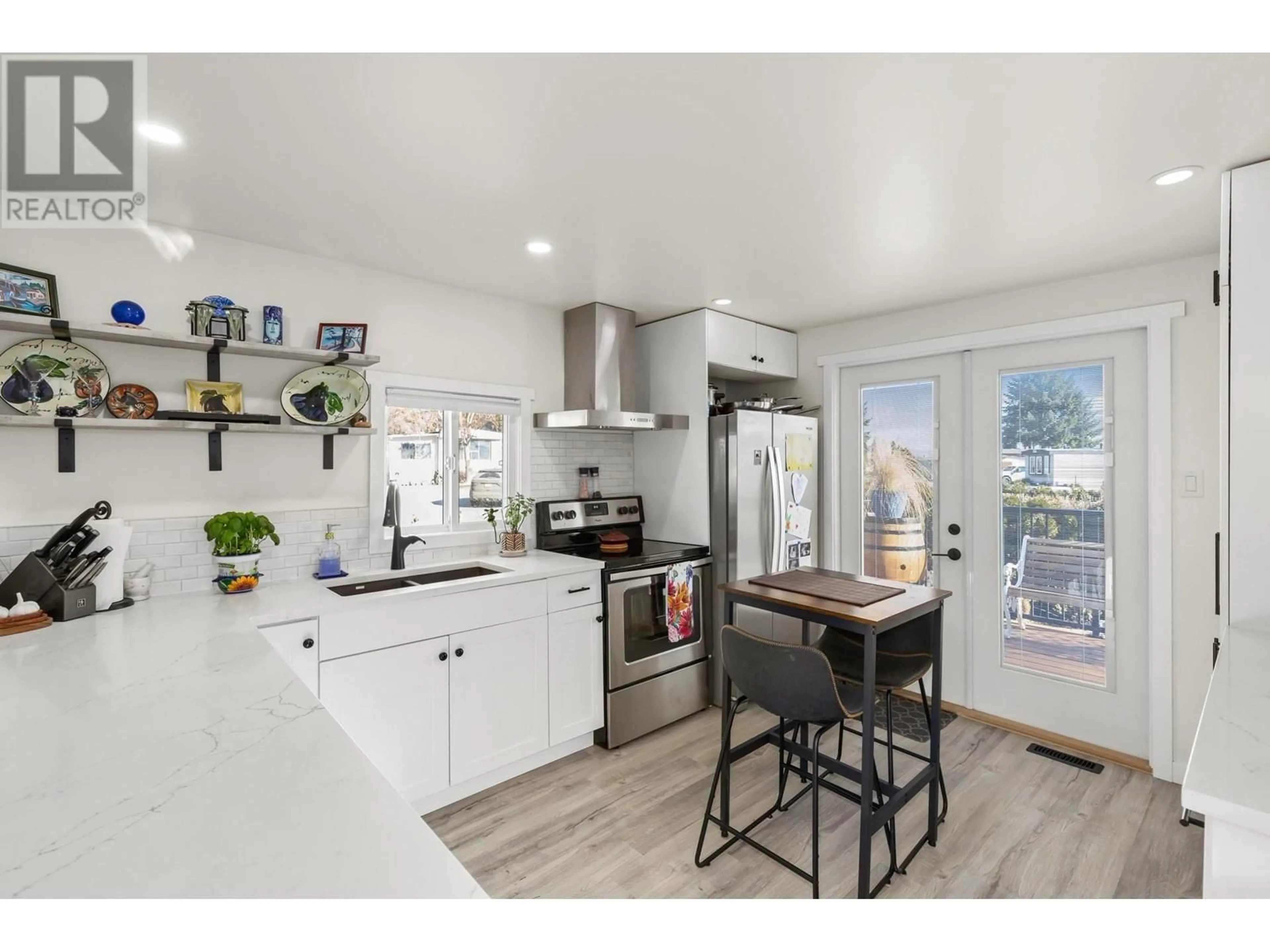 Open concept kitchen for 6663 97 Highway S Unit# 16, Peachland British Columbia V0H1X7