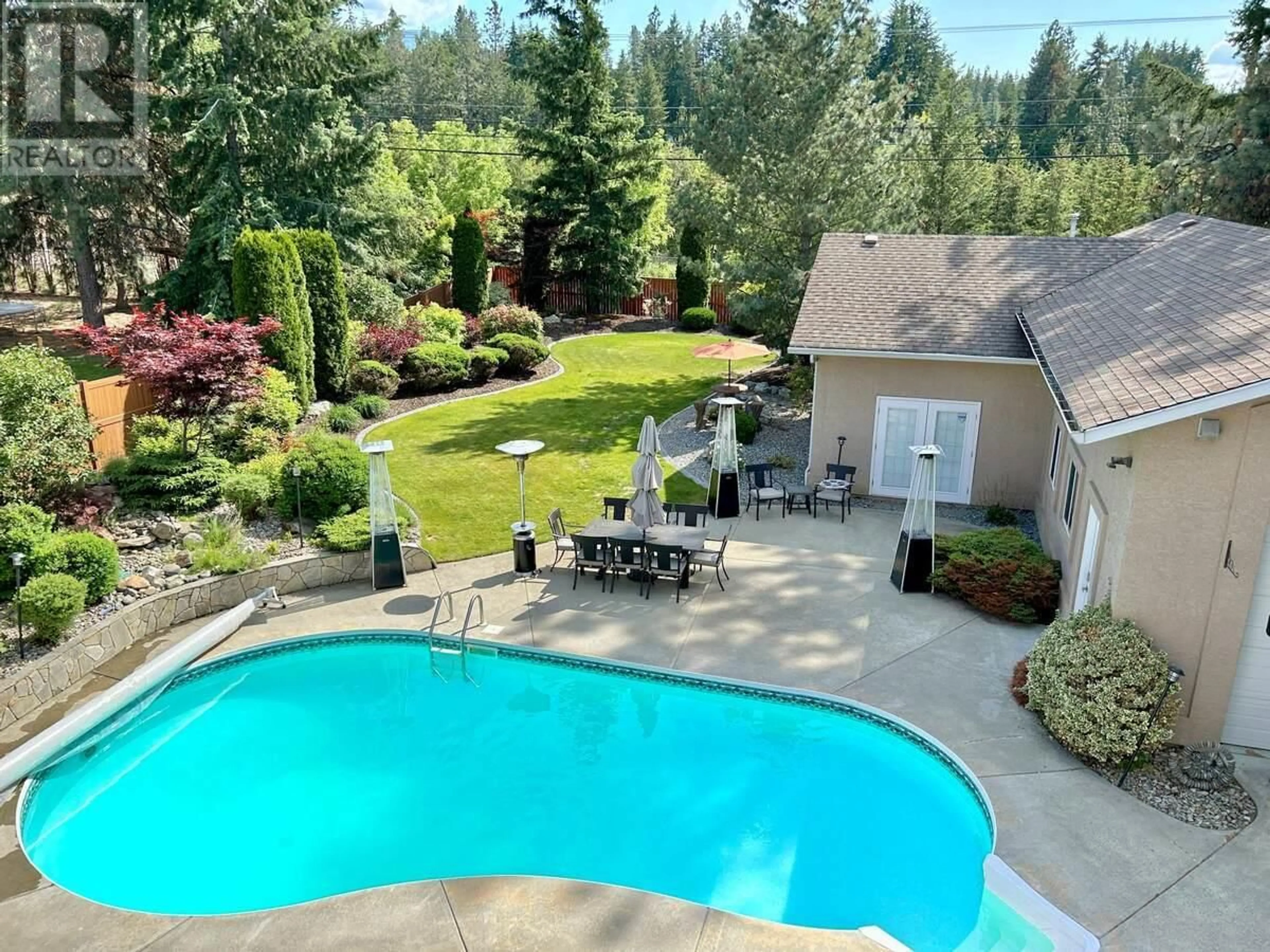 A pic from outside/outdoor area/front of a property/back of a property/a pic from drone, water/lake/river/ocean view for 3911 LAKEVALE PLACE, Kelowna British Columbia V1W3Z5