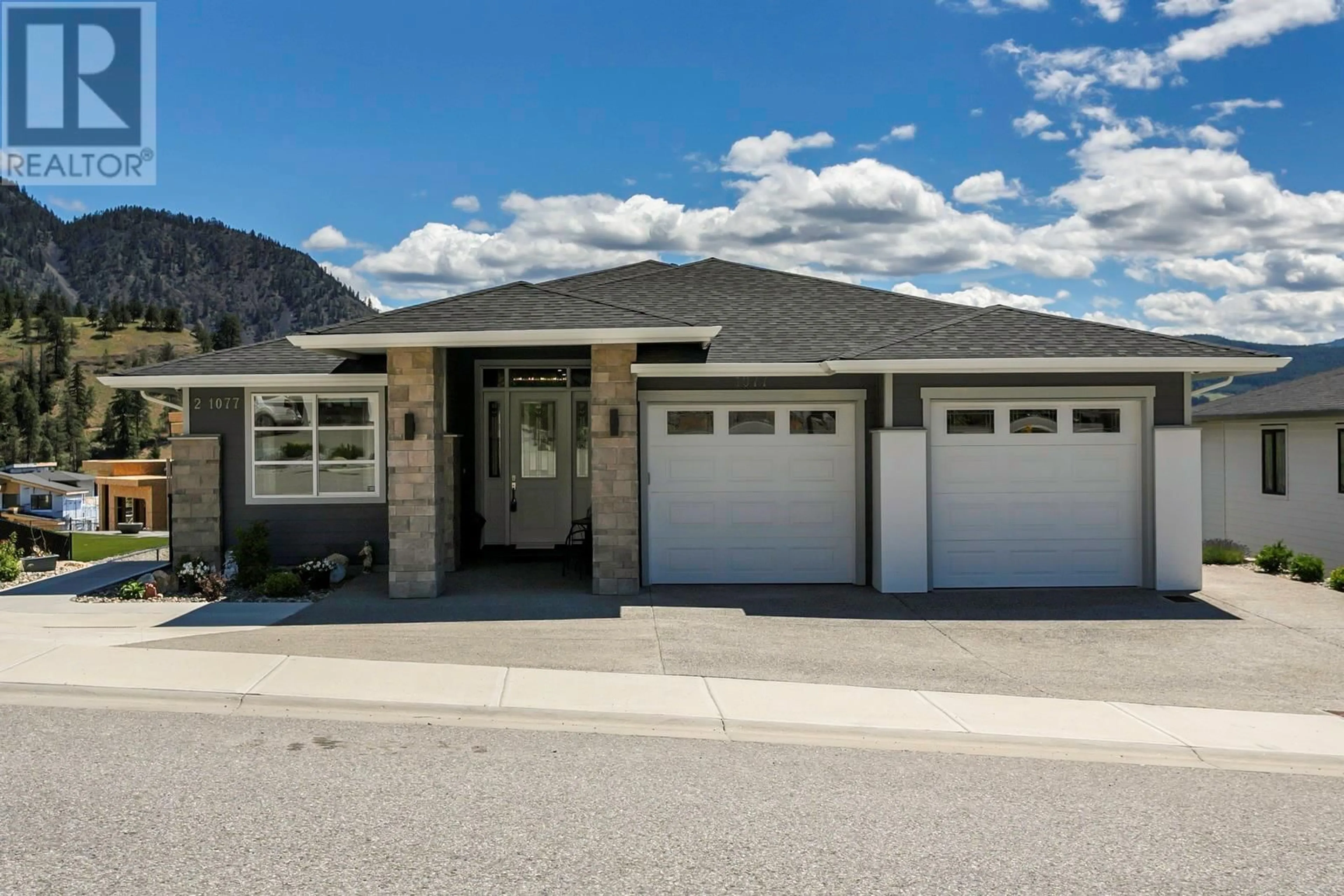 Frontside or backside of a home for 1077 Loseth Drive, Kelowna British Columbia V1P0A1