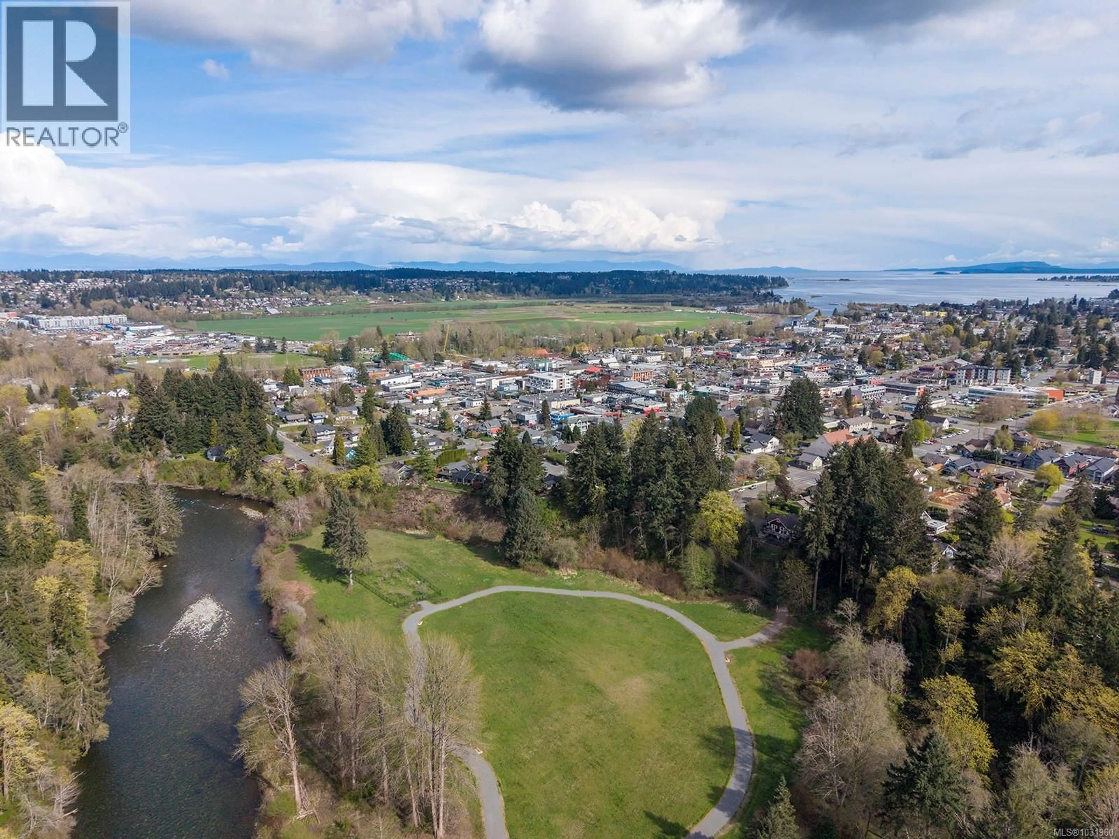 A pic from outside/outdoor area/front of a property/back of a property/a pic from drone, water/lake/river/ocean view for 325 HARMSTON AVENUE, Courtenay British Columbia V9N2X1