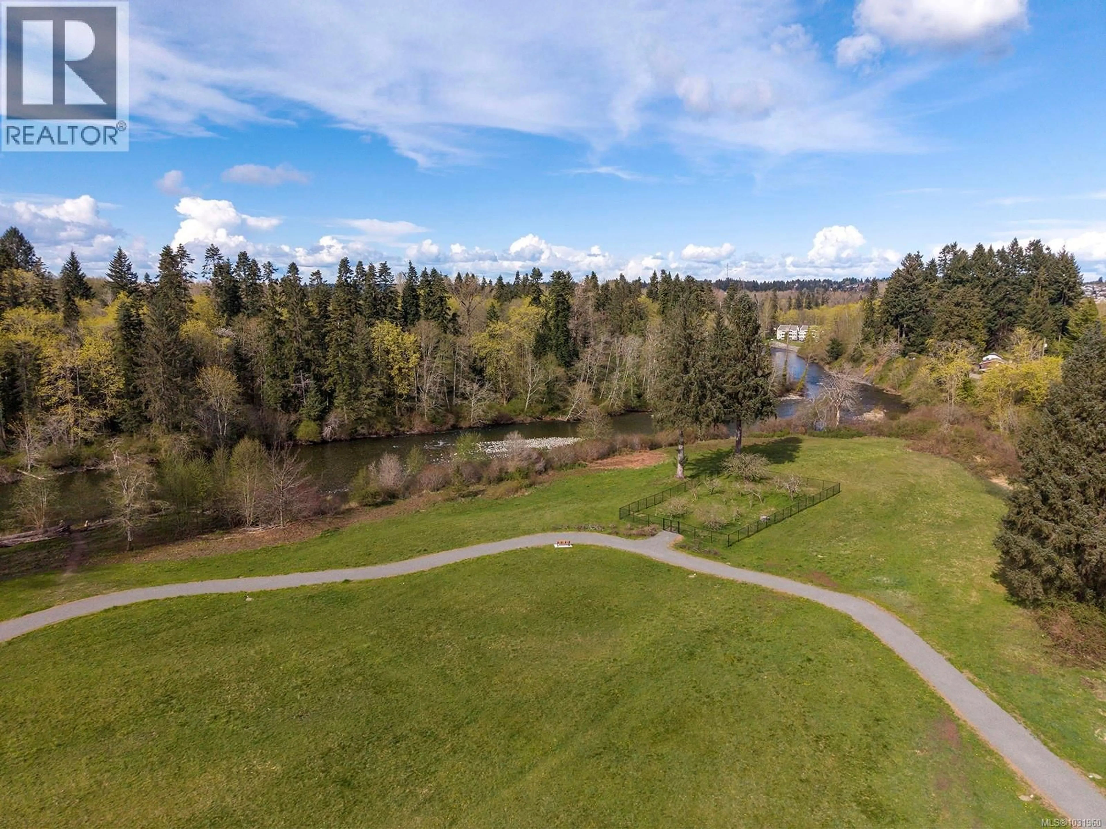 A pic from outside/outdoor area/front of a property/back of a property/a pic from drone, water/lake/river/ocean view for 325 HARMSTON AVENUE, Courtenay British Columbia V9N2X1