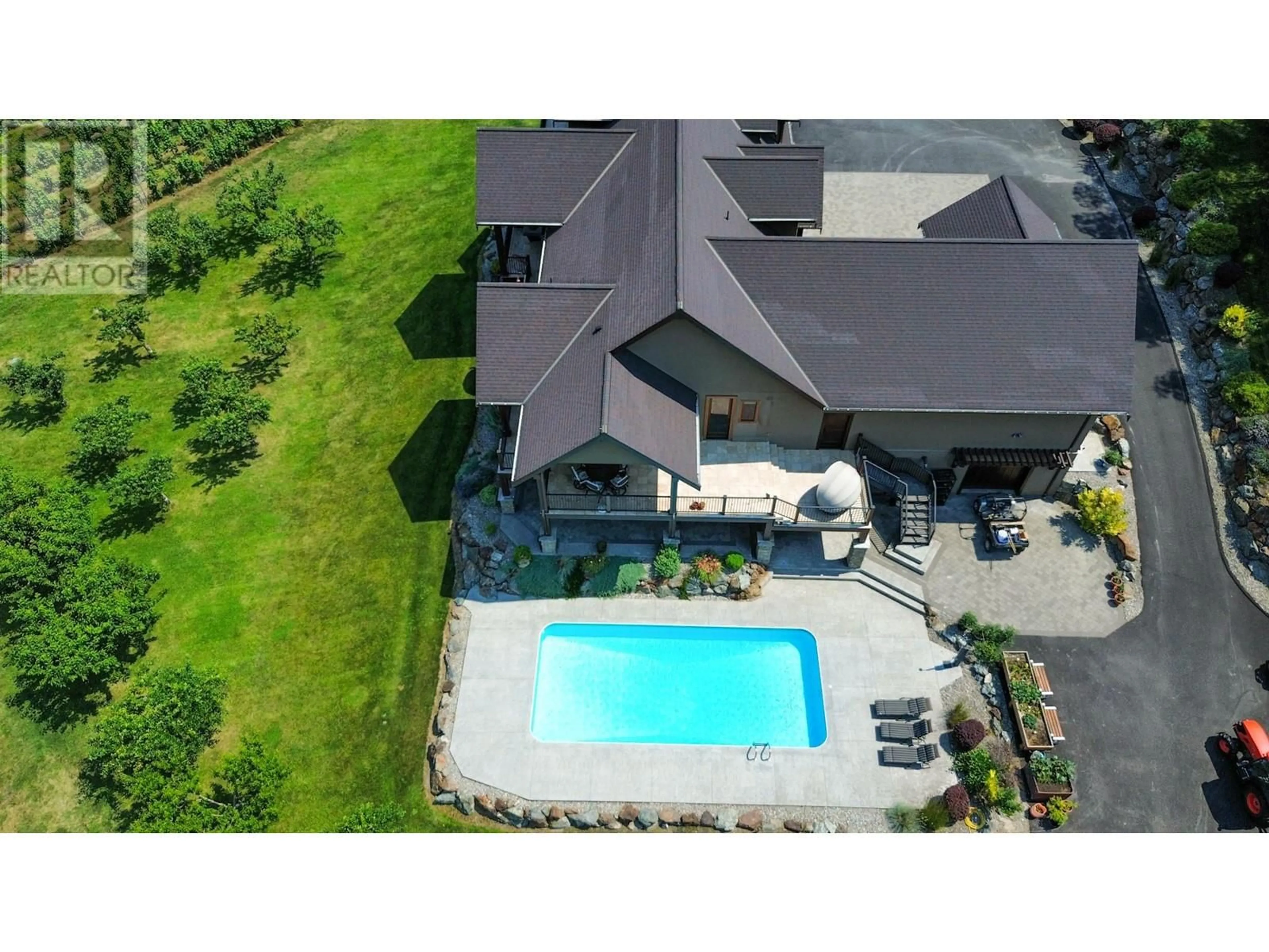A pic from outside/outdoor area/front of a property/back of a property/a pic from drone, mountain view for 3175 VALLEYVIEW ROAD, Penticton British Columbia V2A8W8