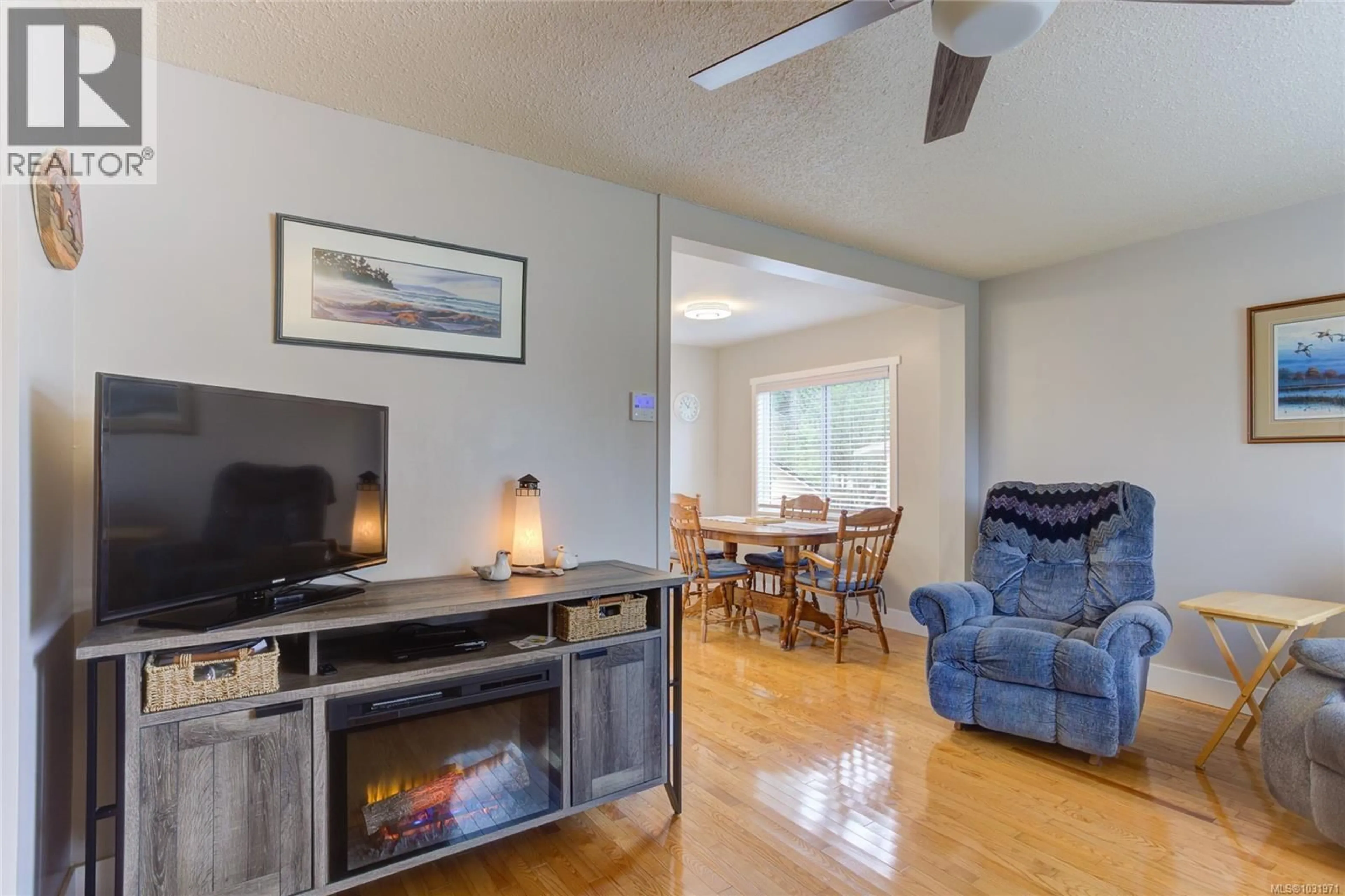 Living room with furniture, wood/laminate floor for 81 LARCH STREET, Lake Cowichan British Columbia V0R2G0