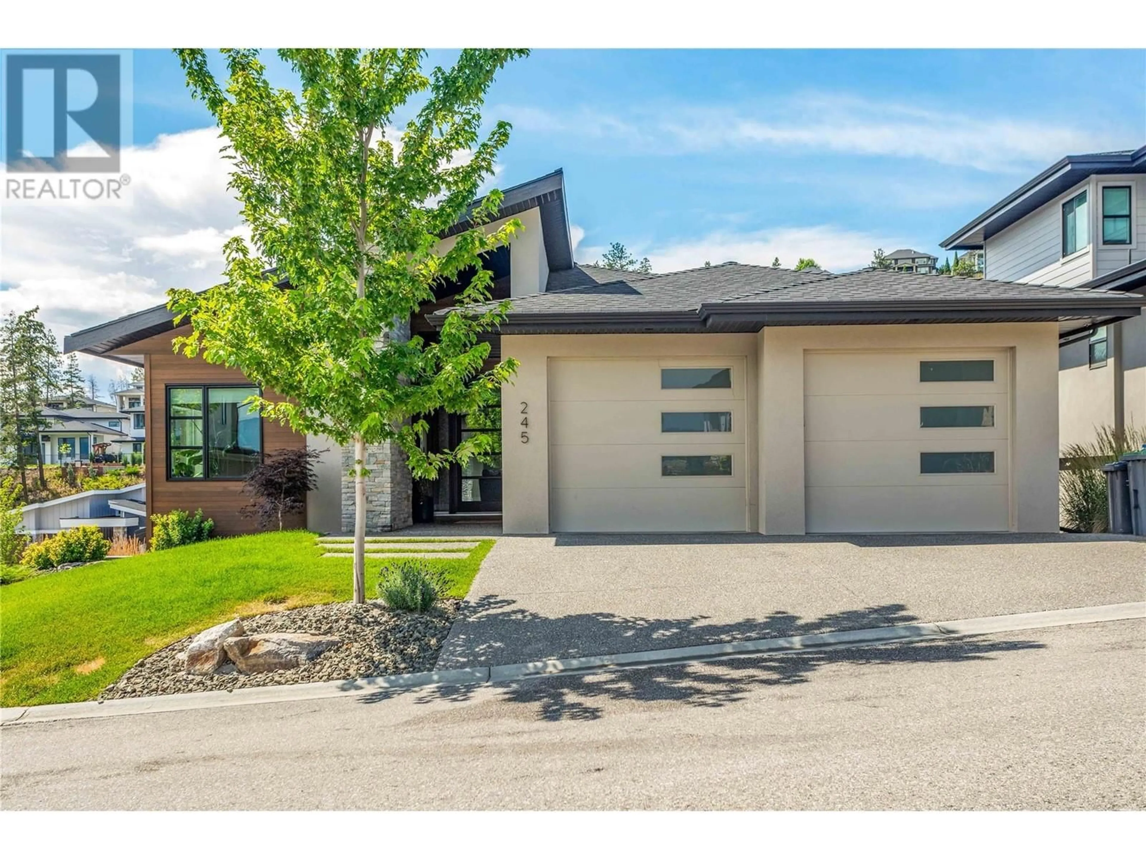 Frontside or backside of a home, the street view for 245 Summer Wood Drive, Kelowna British Columbia V1V0C9