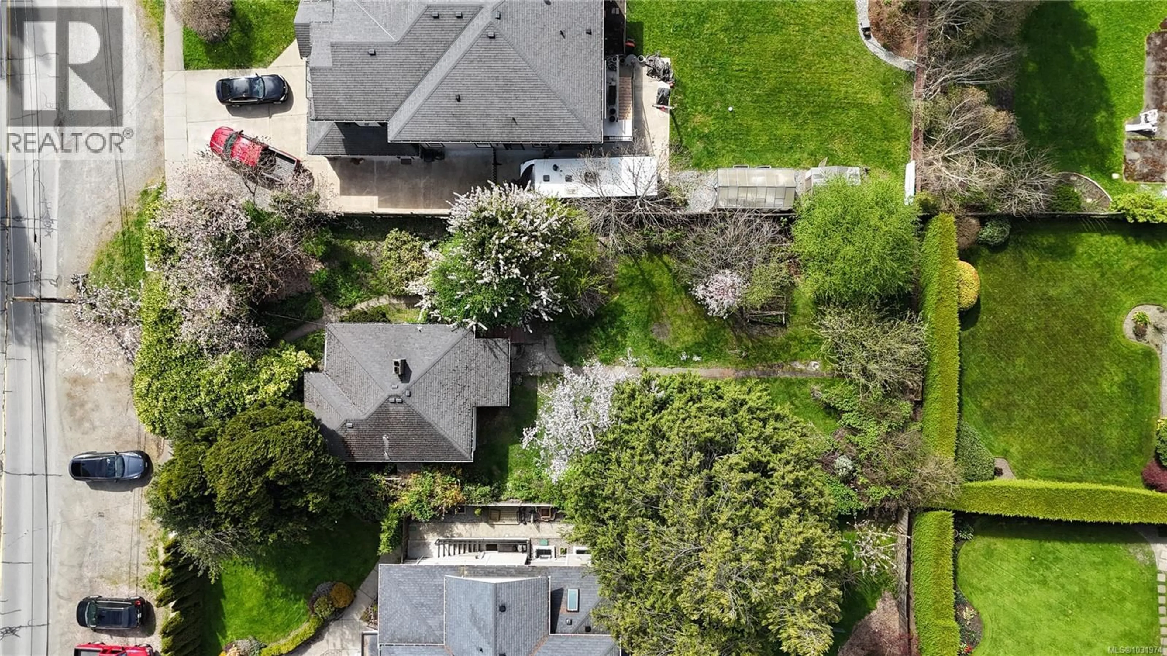 A pic from outside/outdoor area/front of a property/back of a property/a pic from drone, street for 5190 CORDOVA BAY ROAD, Saanich British Columbia V8Y2K8