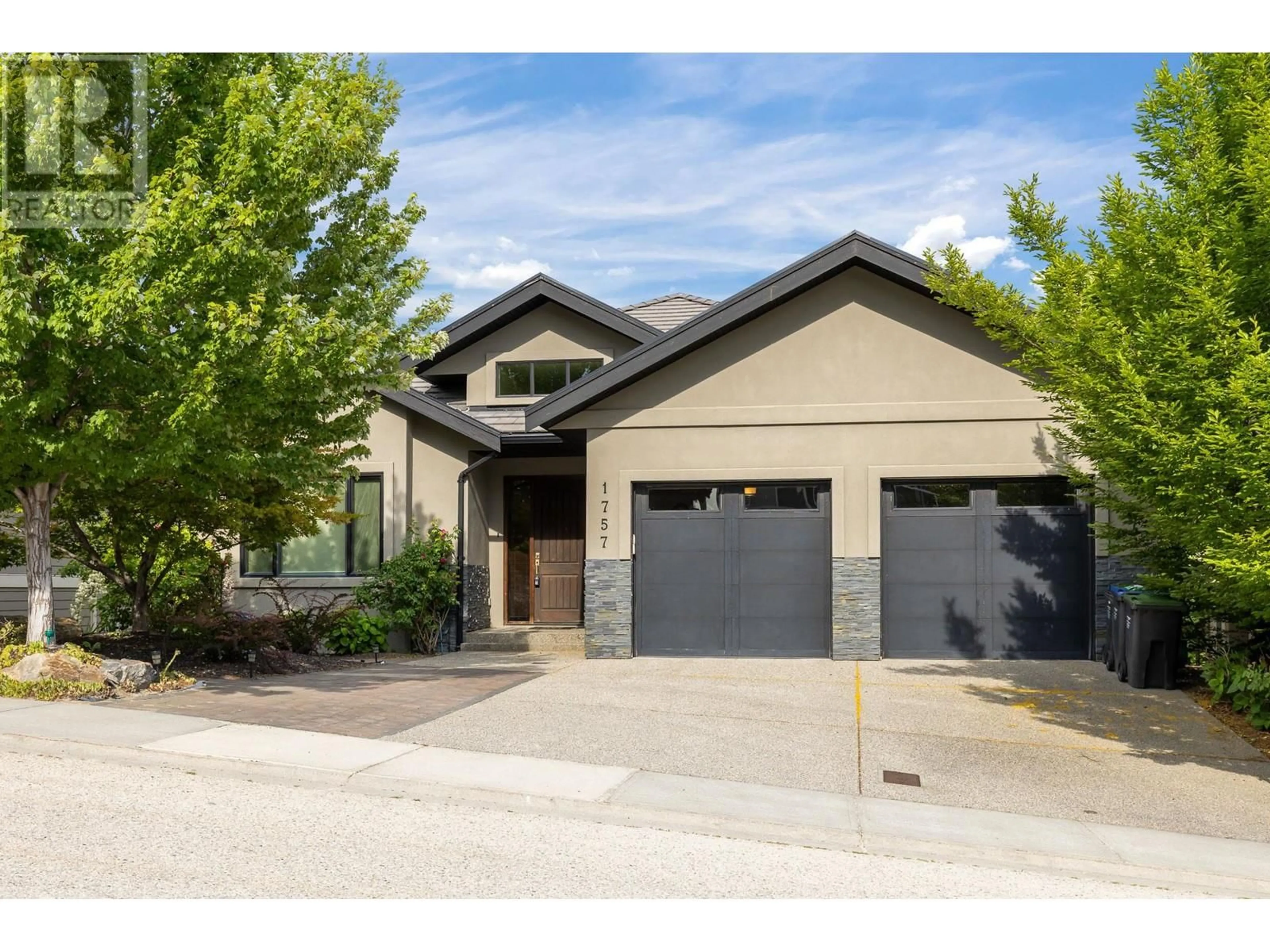 Frontside or backside of a home for 1757 Capistrano Drive, Kelowna British Columbia V1V2Z3