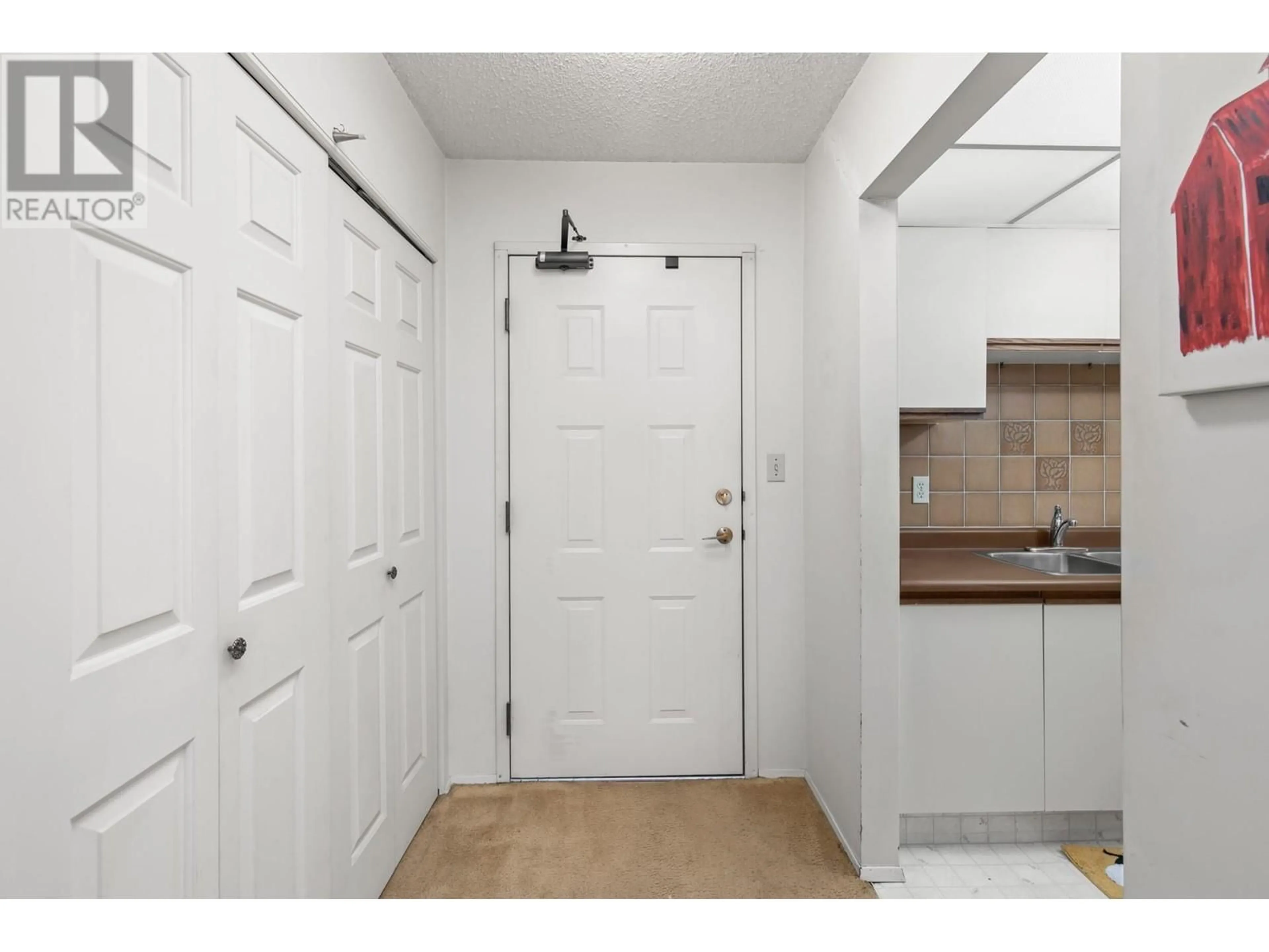 Storage room or clothes room or walk-in closet for 1056 Bernard Avenue Unit# 310, Kelowna British Columbia V1Y8L7