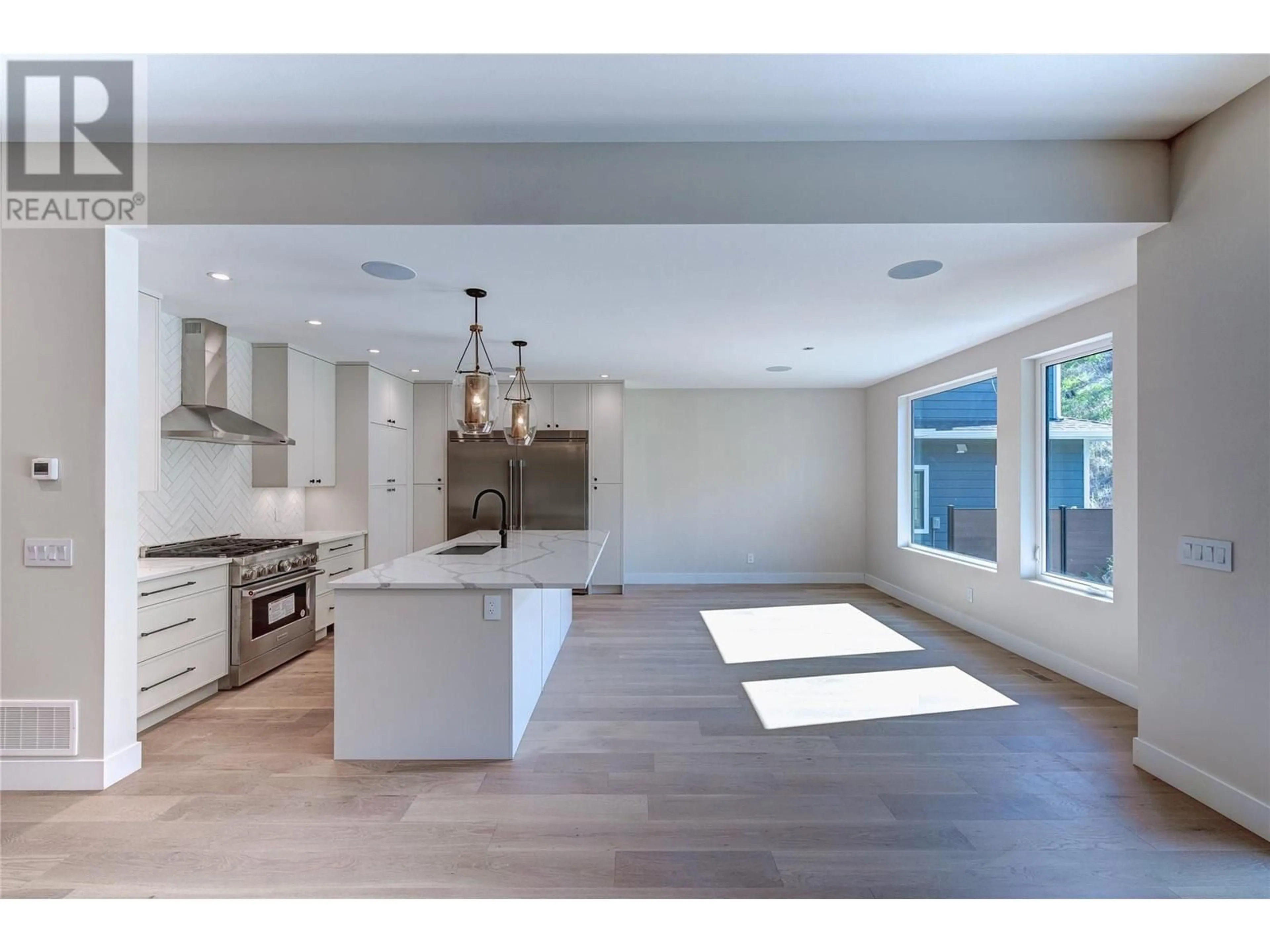 Open concept kitchen for 451 Vision Court, Kelowna British Columbia V1W0C4