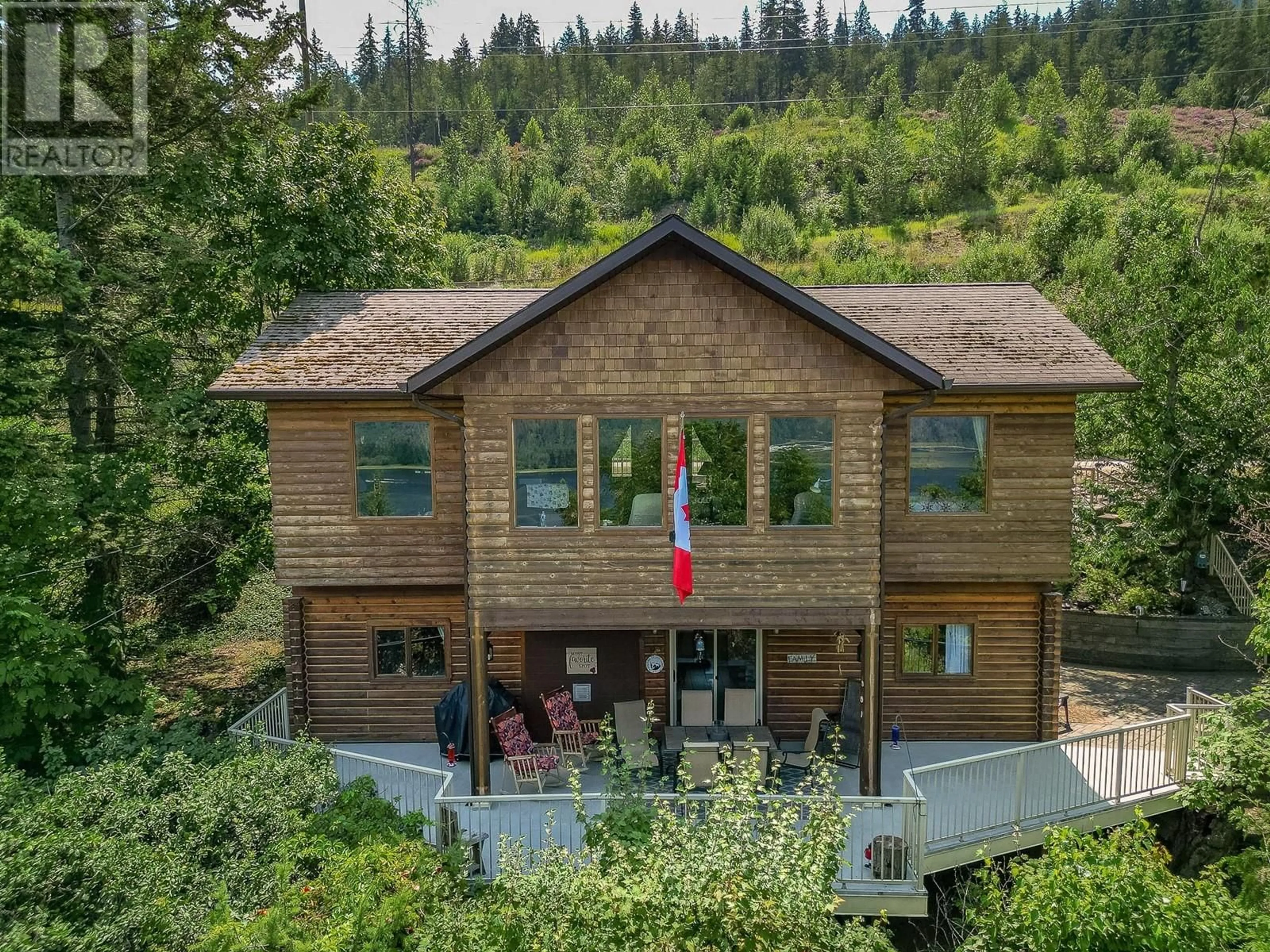 A pic from outside/outdoor area/front of a property/back of a property/a pic from drone, mountain view for 1 OLD SICAMOUS ROAD, Sicamous British Columbia V0E2V0