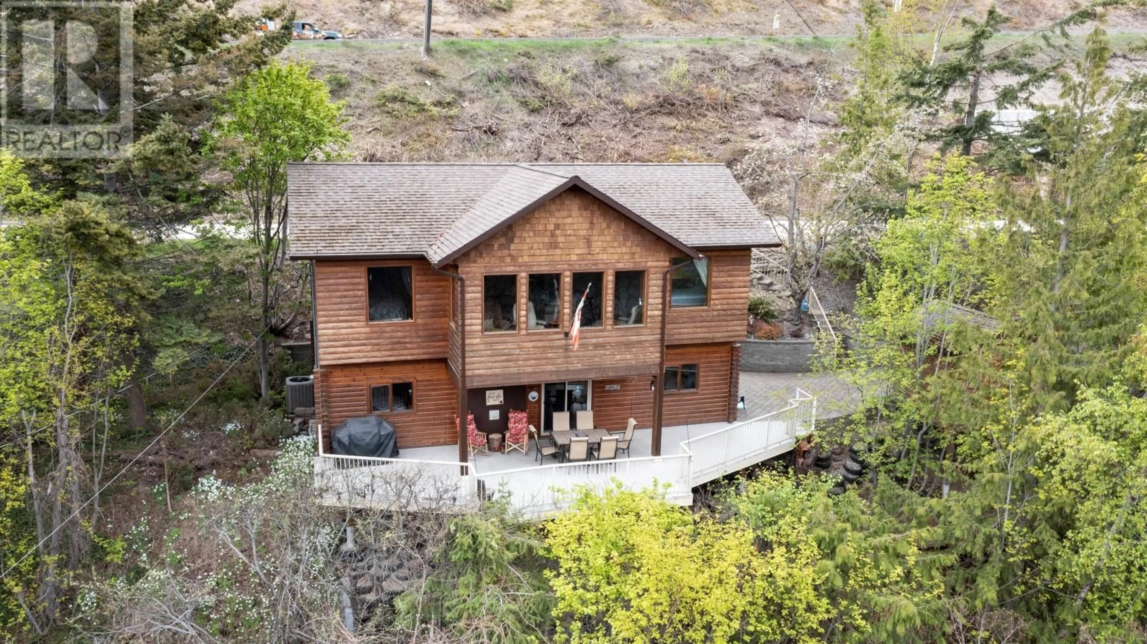 Frontside or backside of a home for 1 Old Sicamous Road, Sicamous British Columbia V0E2V0