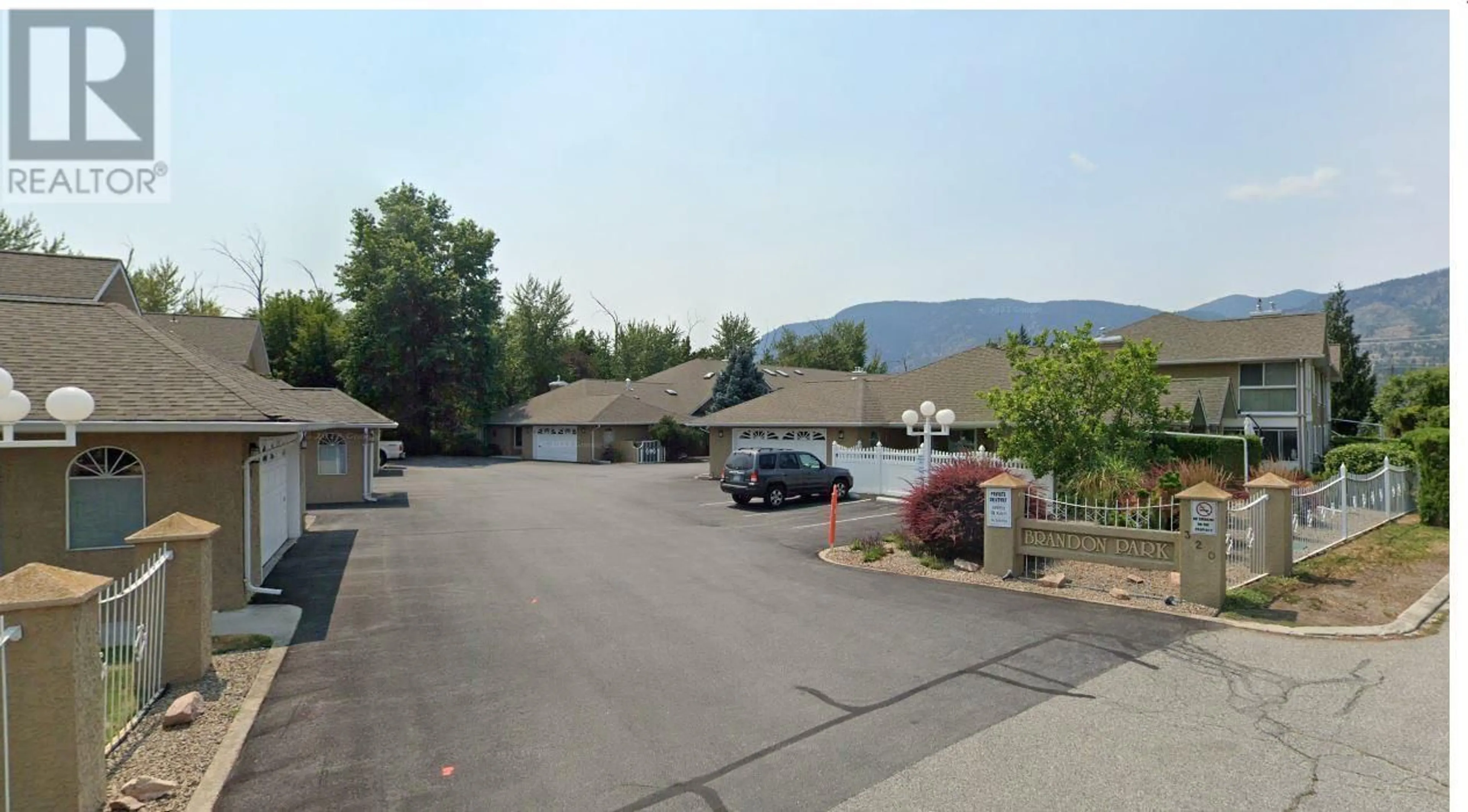 A pic from exterior of the house or condo, the street view for 320 BRANDON Avenue Unit# 107, Penticton British Columbia V2A3S8