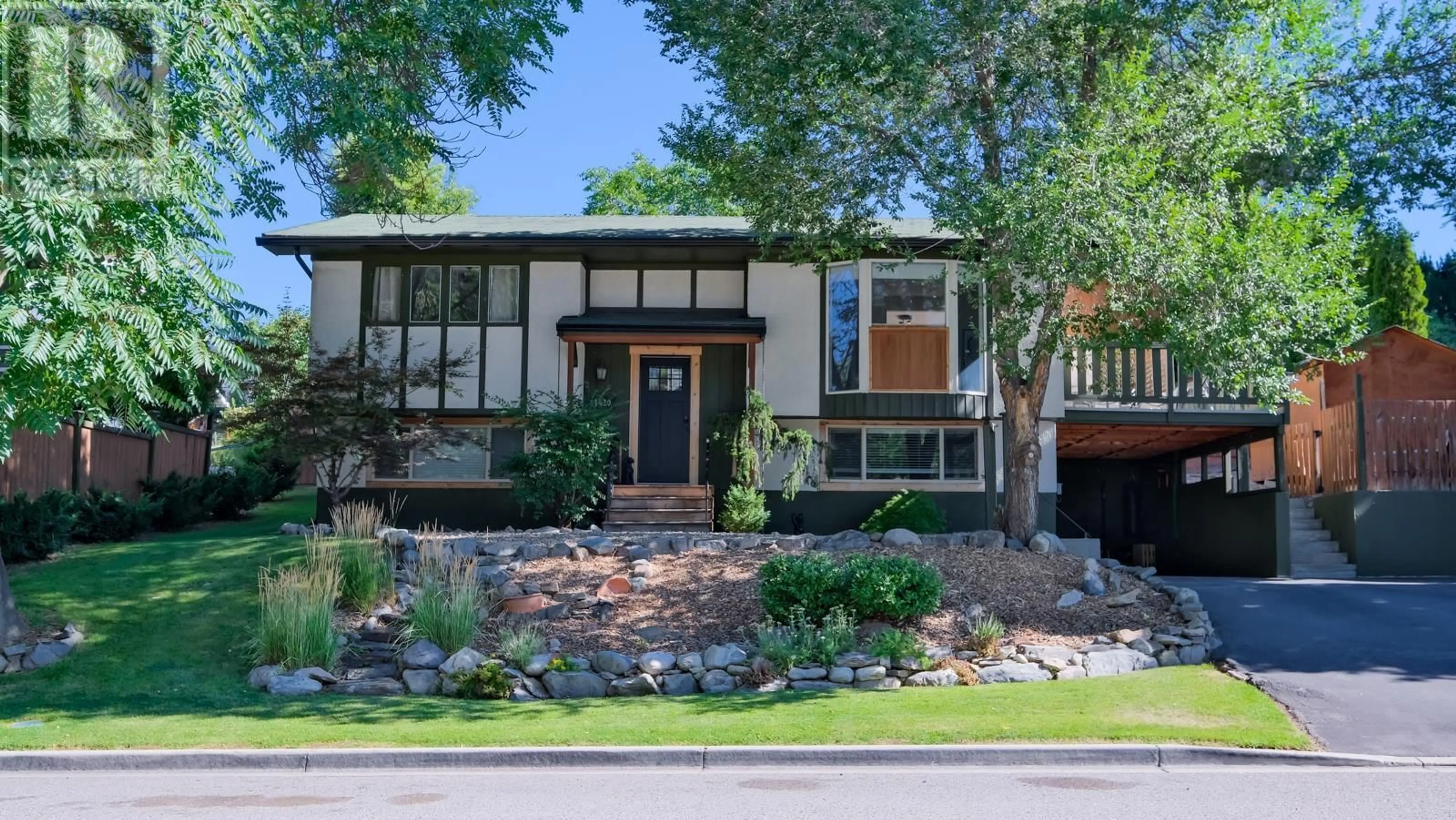 Home with brick exterior material for 1420 Kelglen Crescent, Kelowna British Columbia V1Y6K7