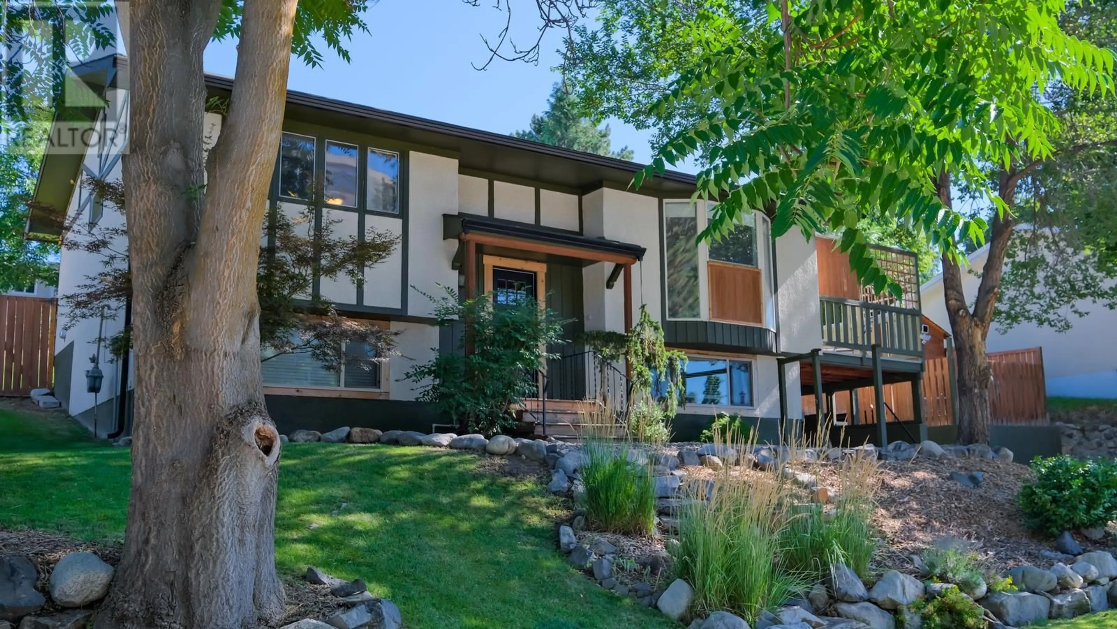 Frontside or backside of a home, cottage for 1420 Kelglen Crescent, Kelowna British Columbia V1Y6K7