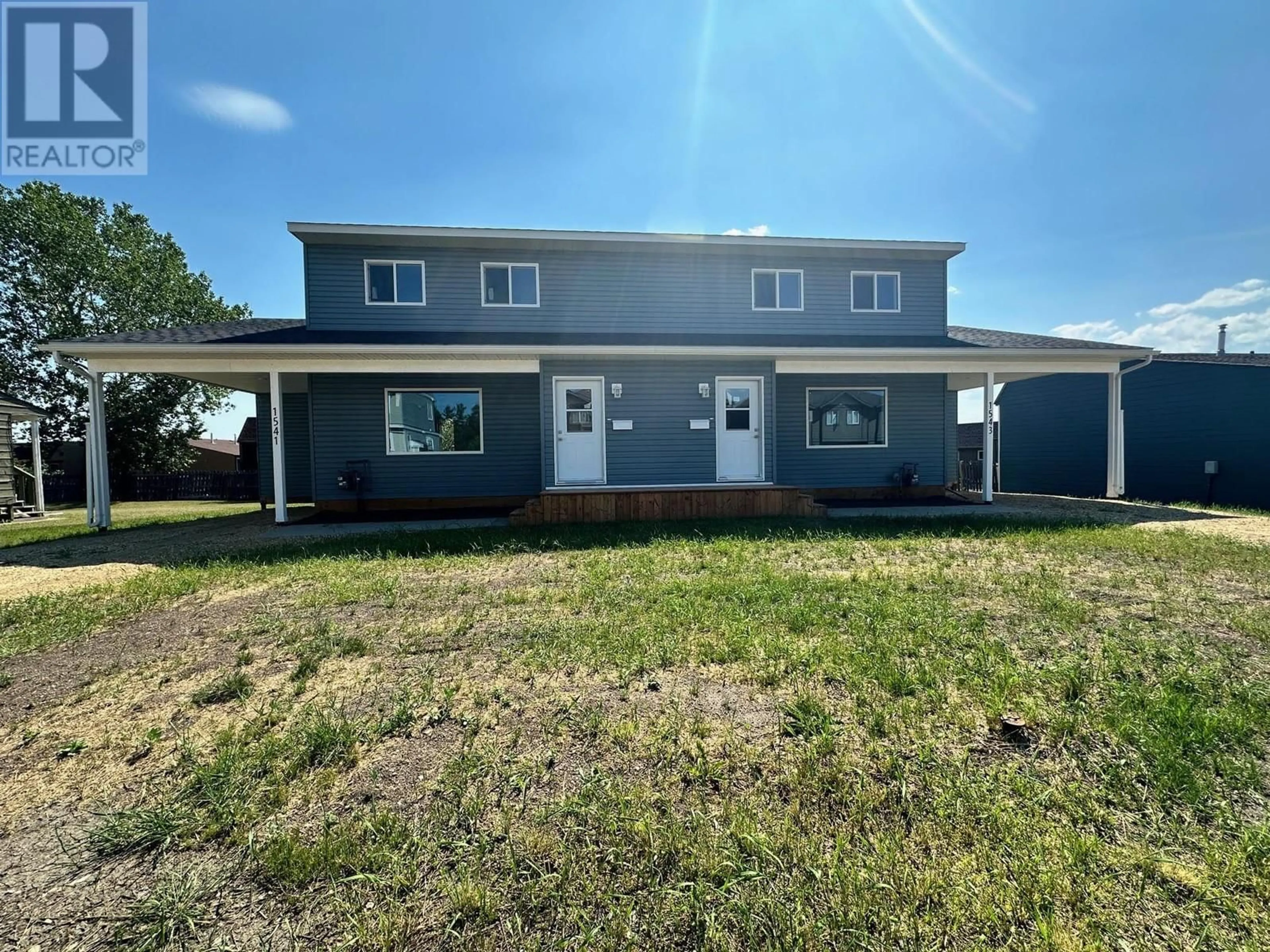 Frontside or backside of a home, the front or back of building for 1541 Loran Drive, Dawson Creek British Columbia V1G1B7