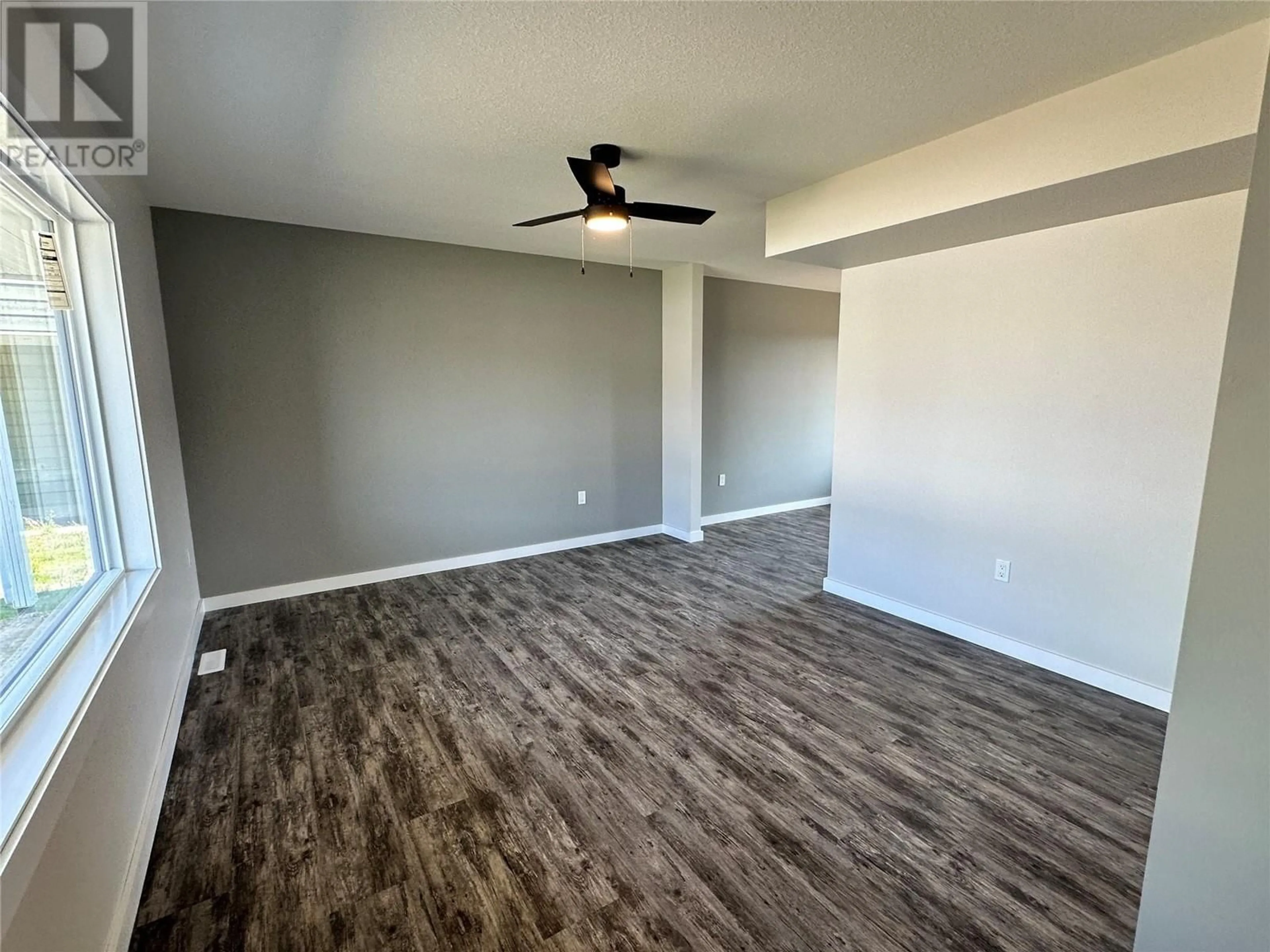 A pic of a room, wood floors for 1541 Loran Drive, Dawson Creek British Columbia V1G1B7