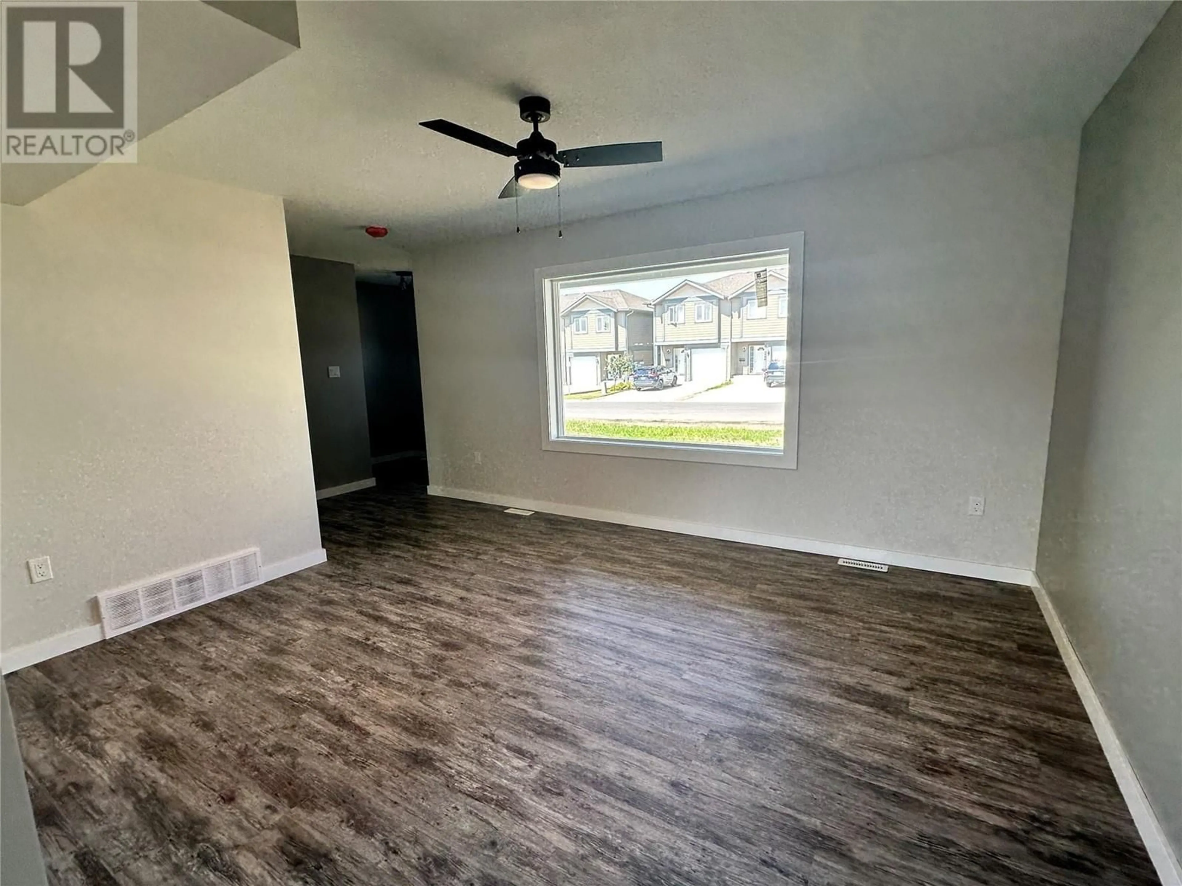 A pic of a room, wood floors for 1541 Loran Drive, Dawson Creek British Columbia V1G1B7