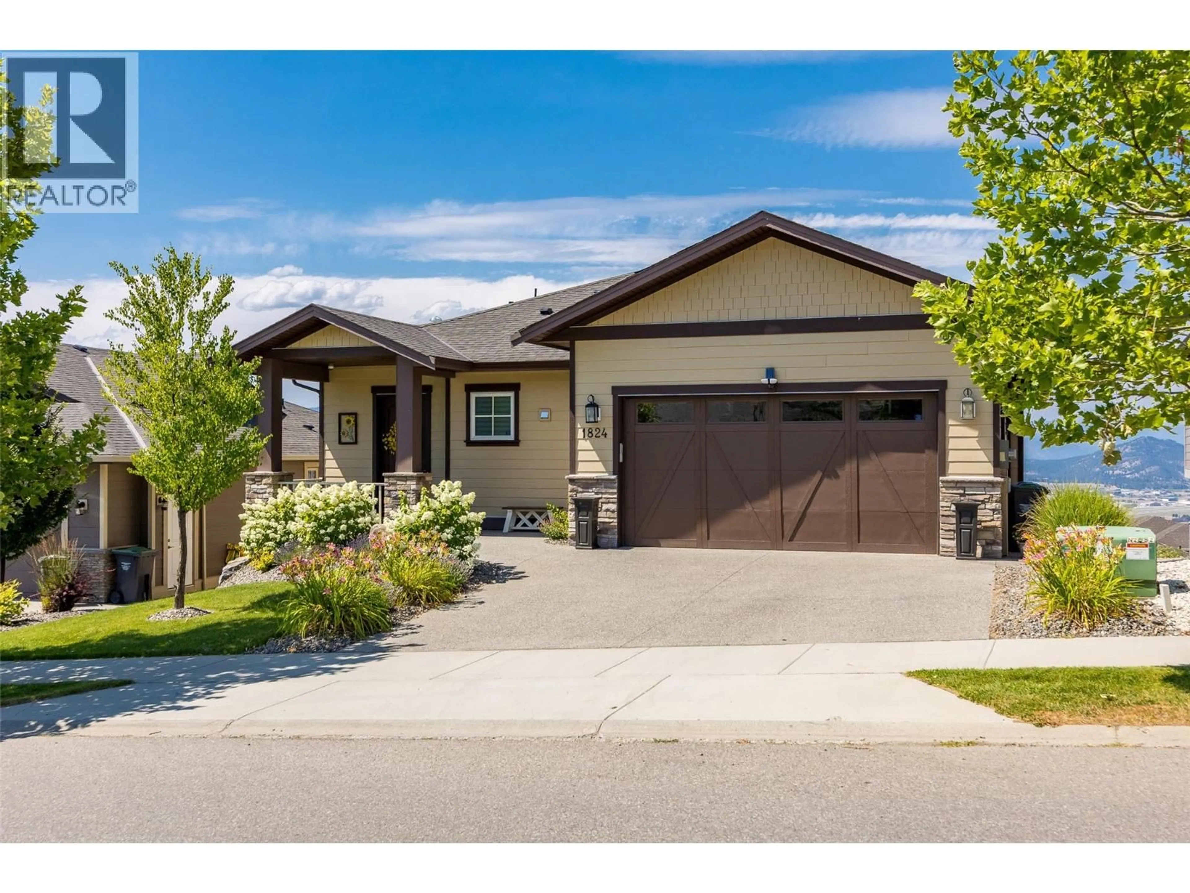 Home with brick exterior material, street for 1824 TOWER RANCH BOULEVARD, Kelowna British Columbia V1P1R1