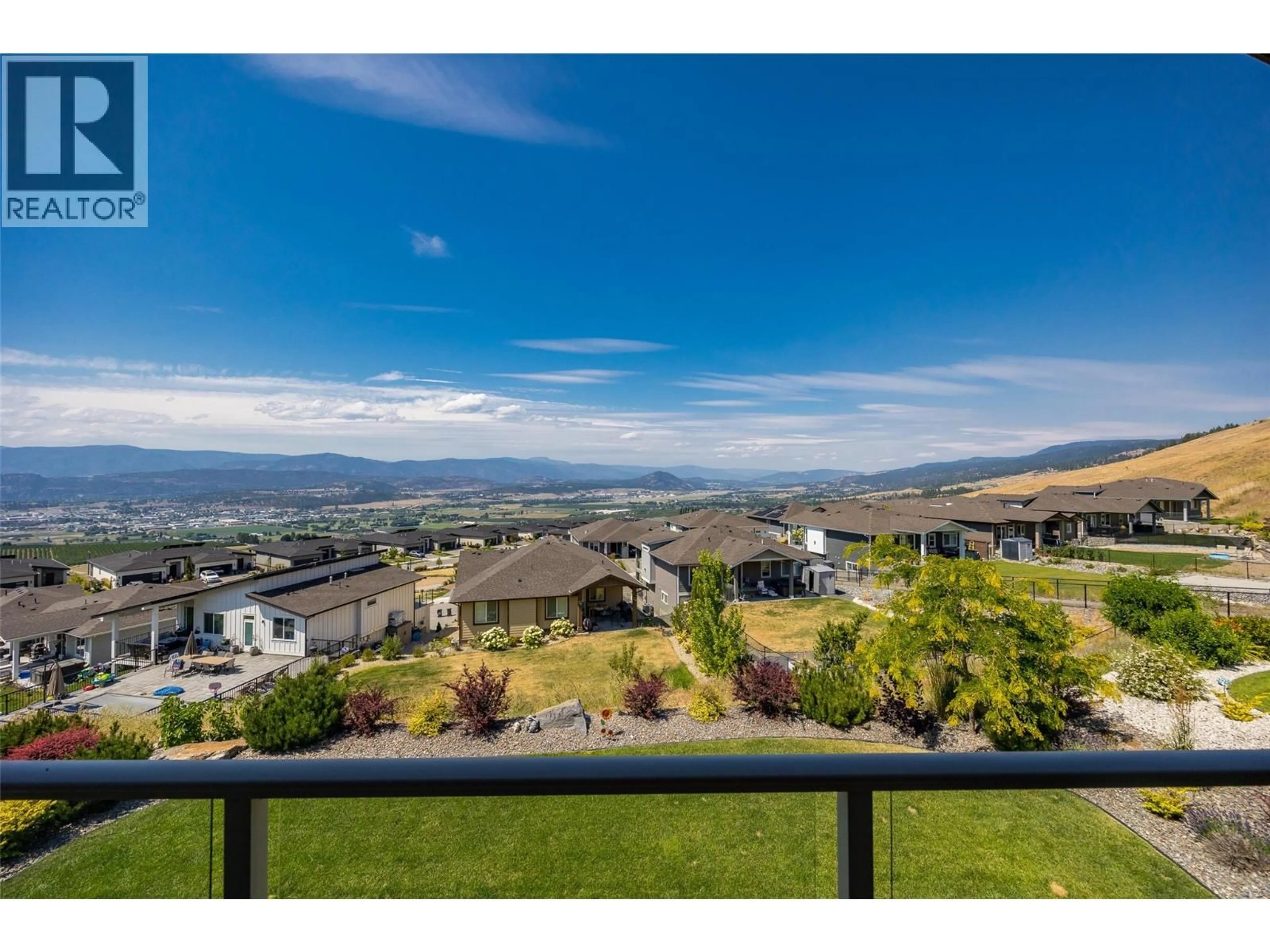 A pic from outside/outdoor area/front of a property/back of a property/a pic from drone, mountain view for 1824 TOWER RANCH BOULEVARD, Kelowna British Columbia V1P1R1
