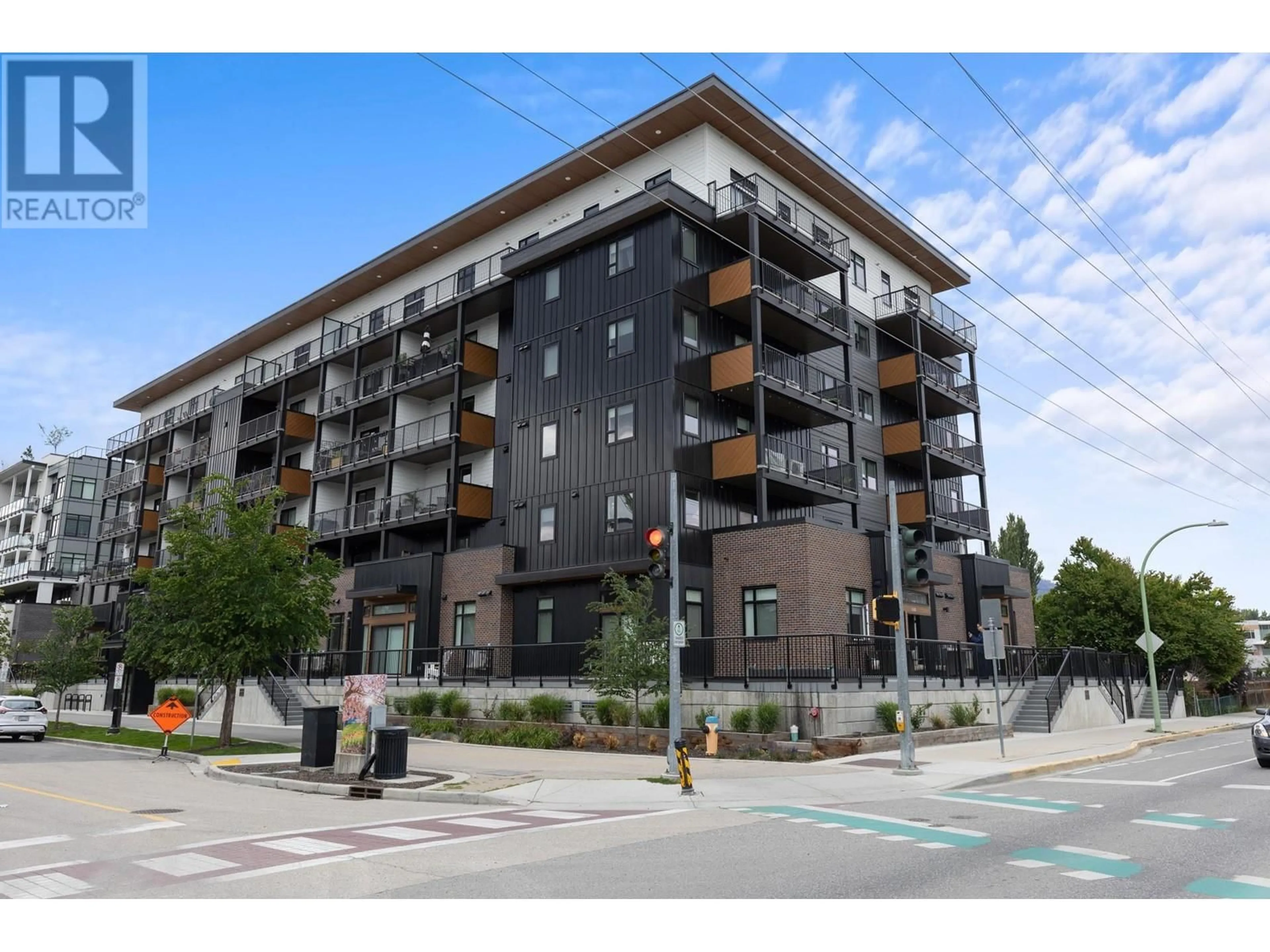 A pic from exterior of the house or condo, the front or back of building for 660 Cawston Avenue N Unit# 111, Kelowna British Columbia V7Y6Z4