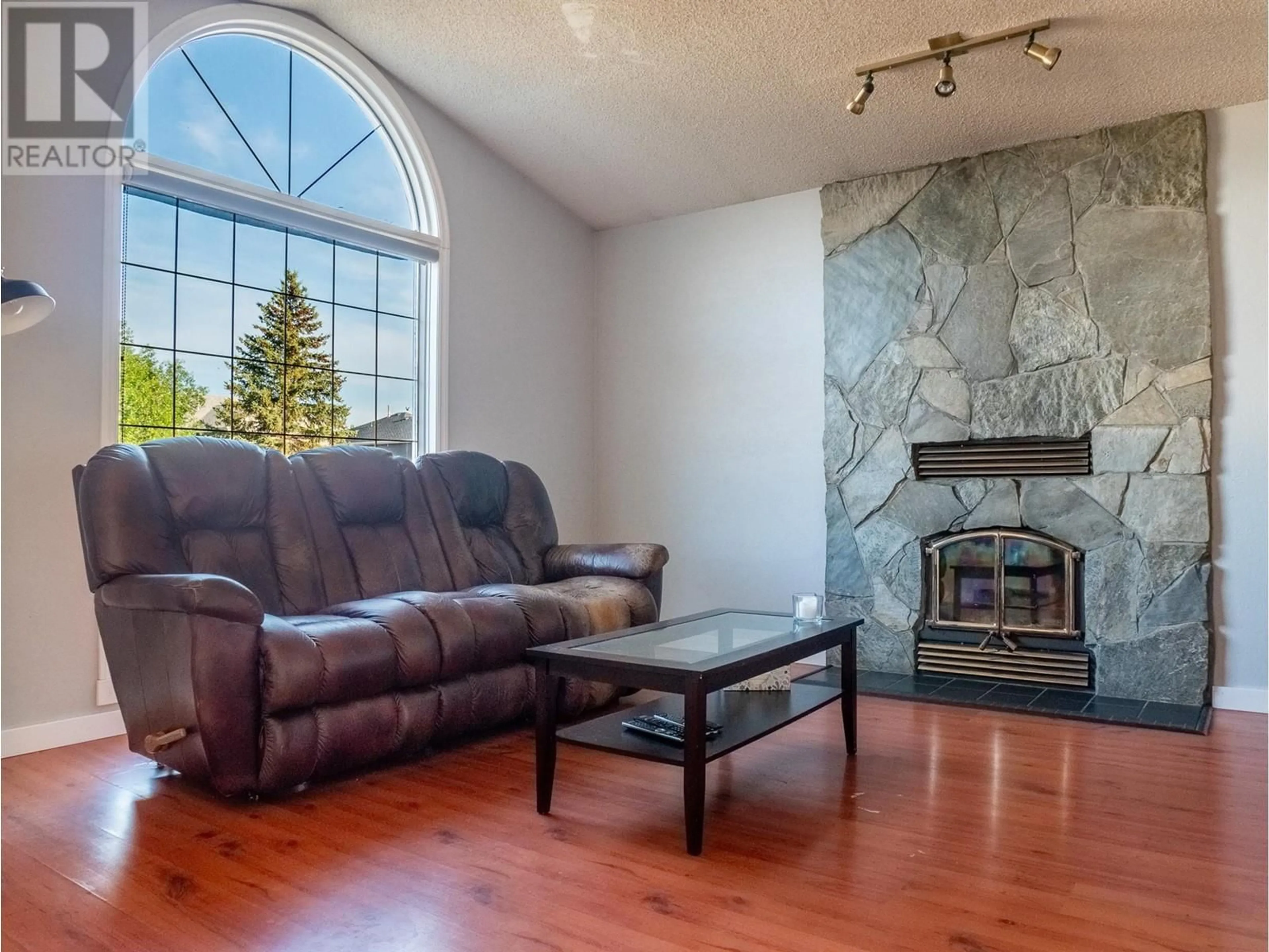 Living room, wood floors for 10720 Cottonwood Crescent, Dawson Creek British Columbia V1G4M4