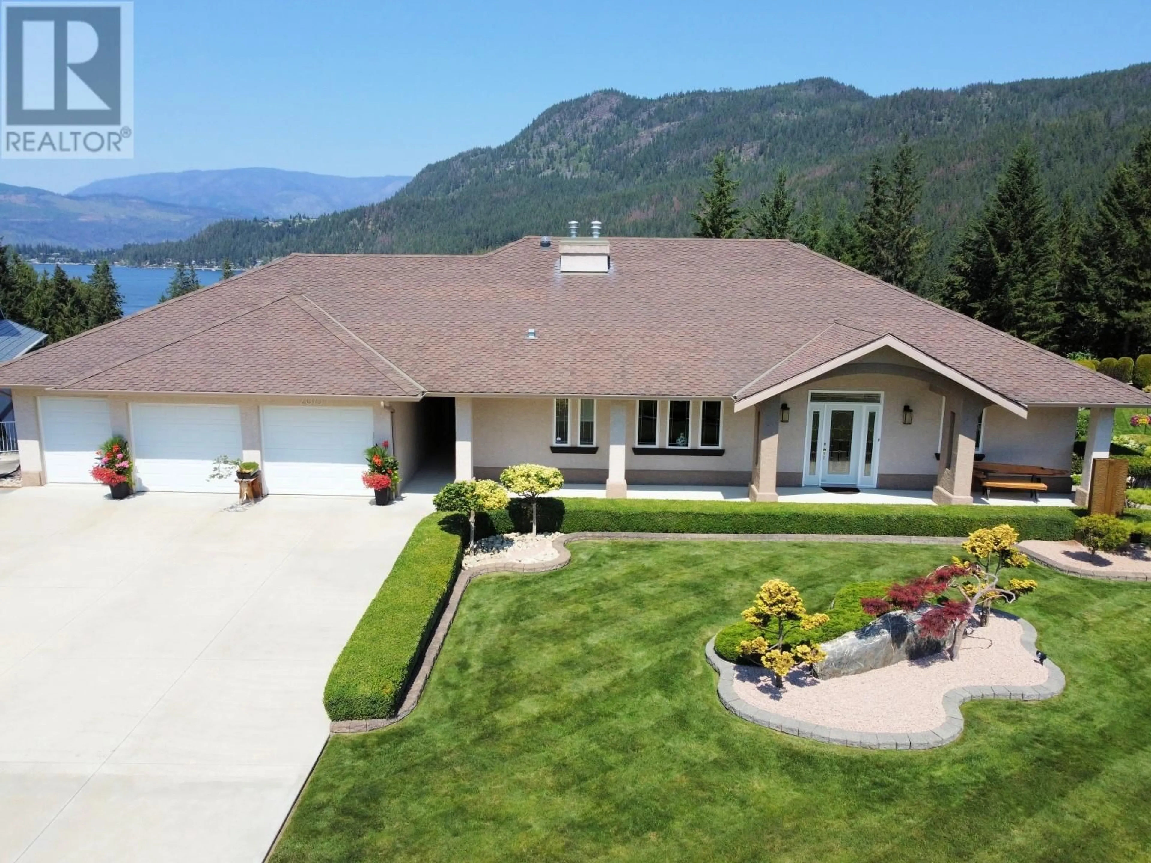 A pic from outside/outdoor area/front of a property/back of a property/a pic from drone, water/lake/river/ocean view for 2675 DOEBERT ROAD, Blind Bay British Columbia V0E1H1
