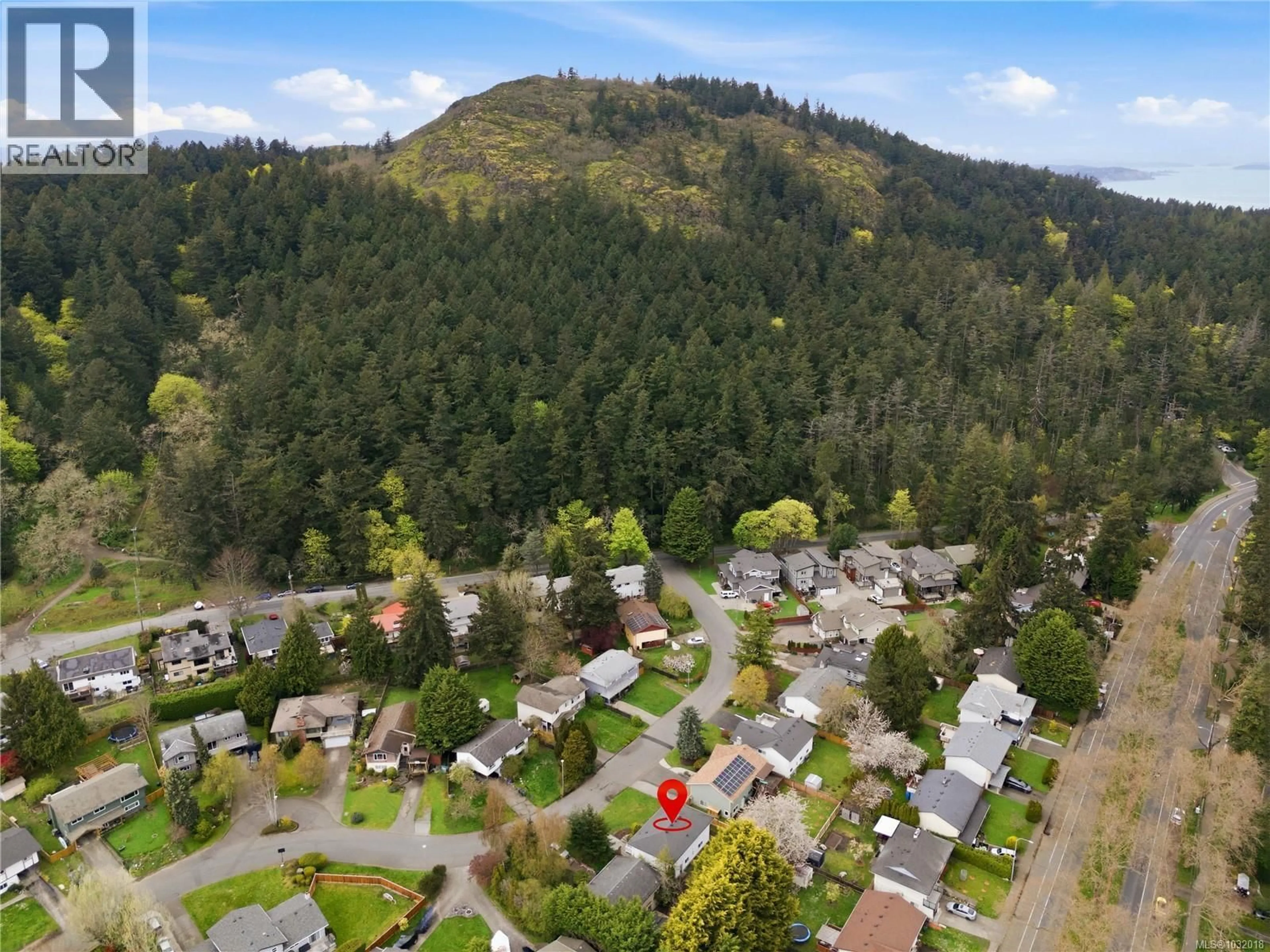 A pic from outside/outdoor area/front of a property/back of a property/a pic from drone, mountain view for 4391 ELNIDO CRESCENT, Saanich British Columbia V8N5G8