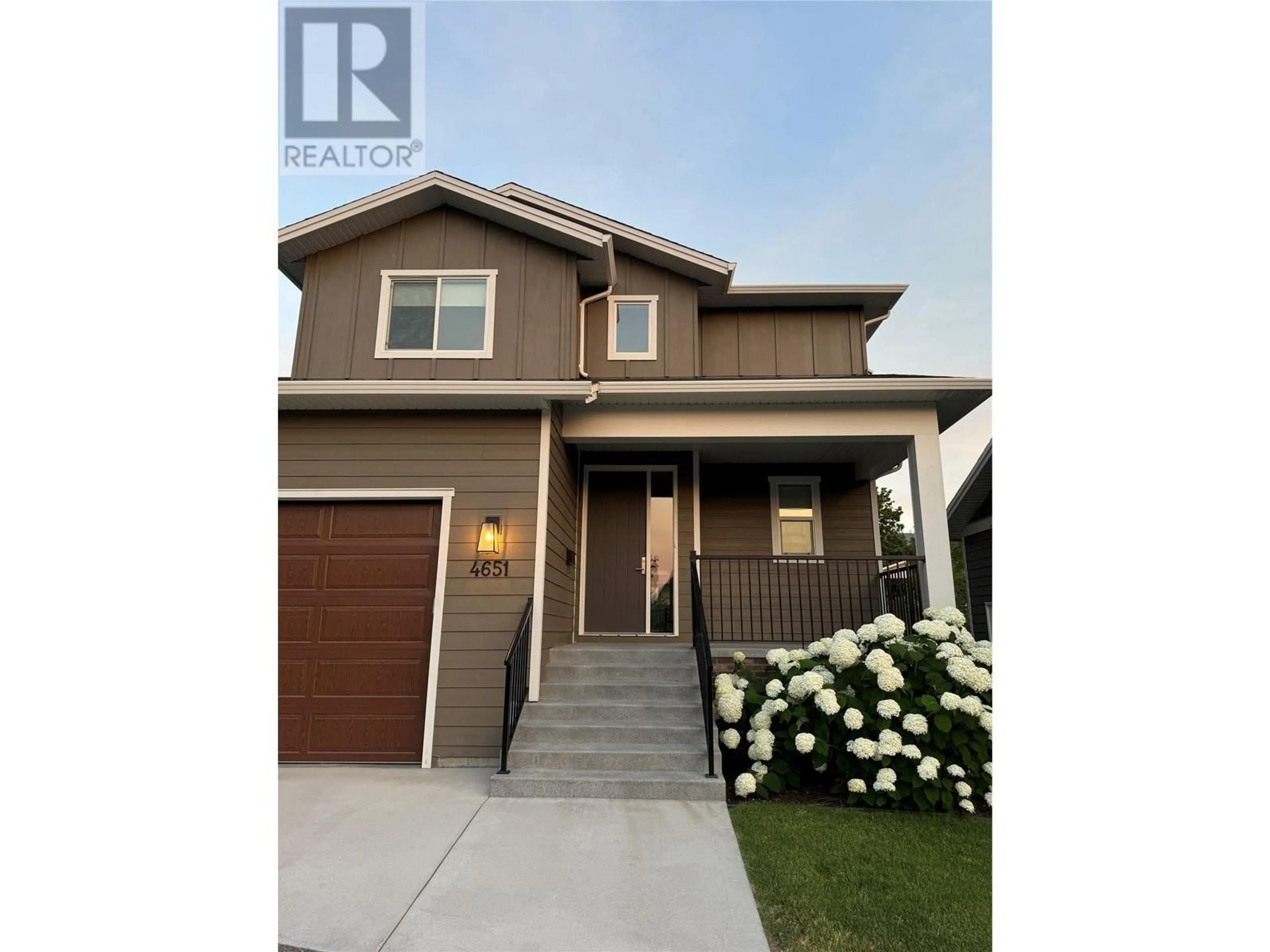 Frontside or backside of a home, the street view for 4651 Raymer Road, Kelowna British Columbia V1W1J4