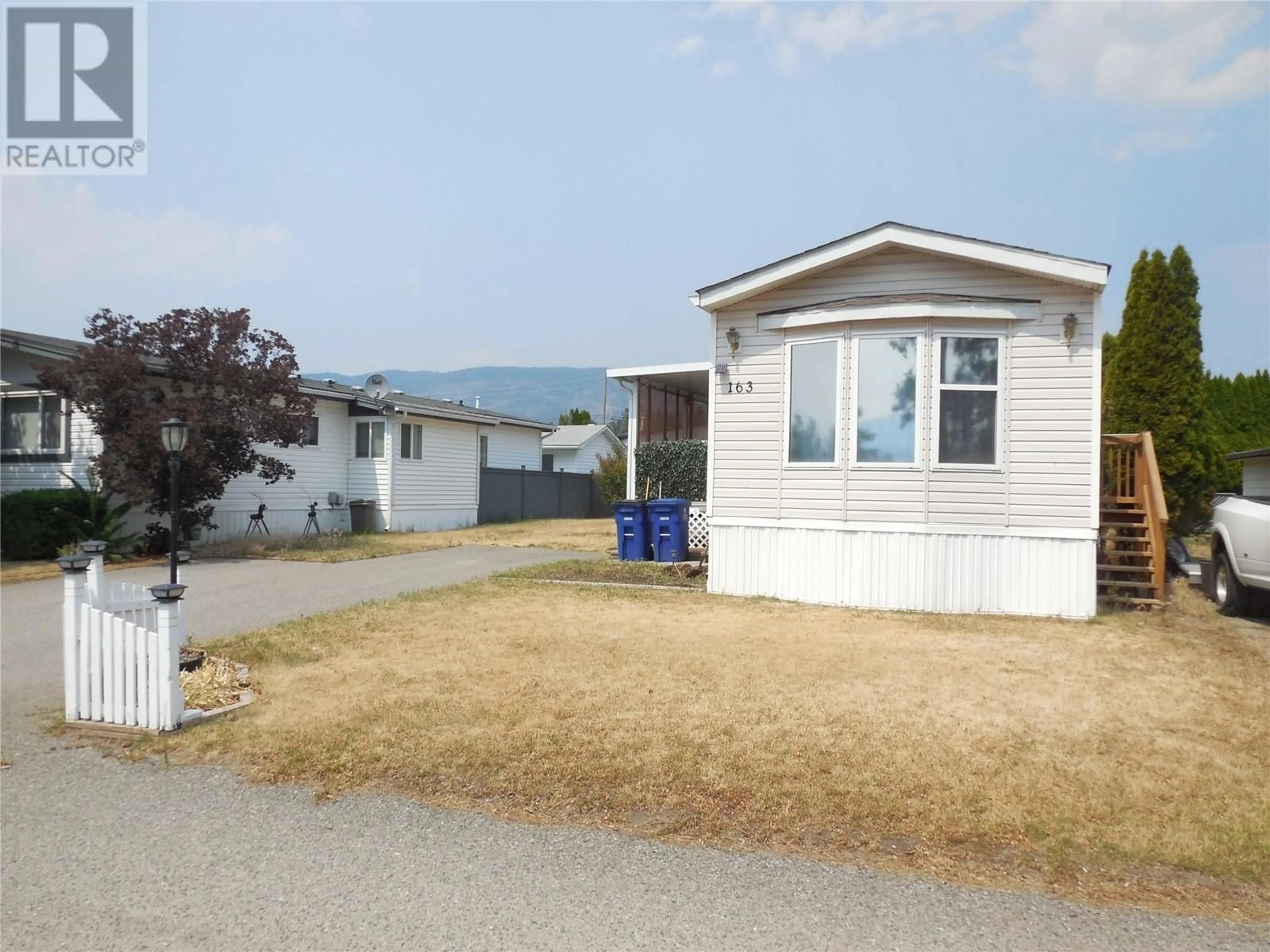 Home with vinyl exterior material for 1880 Old Boucherie Road Unit# 163, West Kelowna British Columbia V4T1Z3