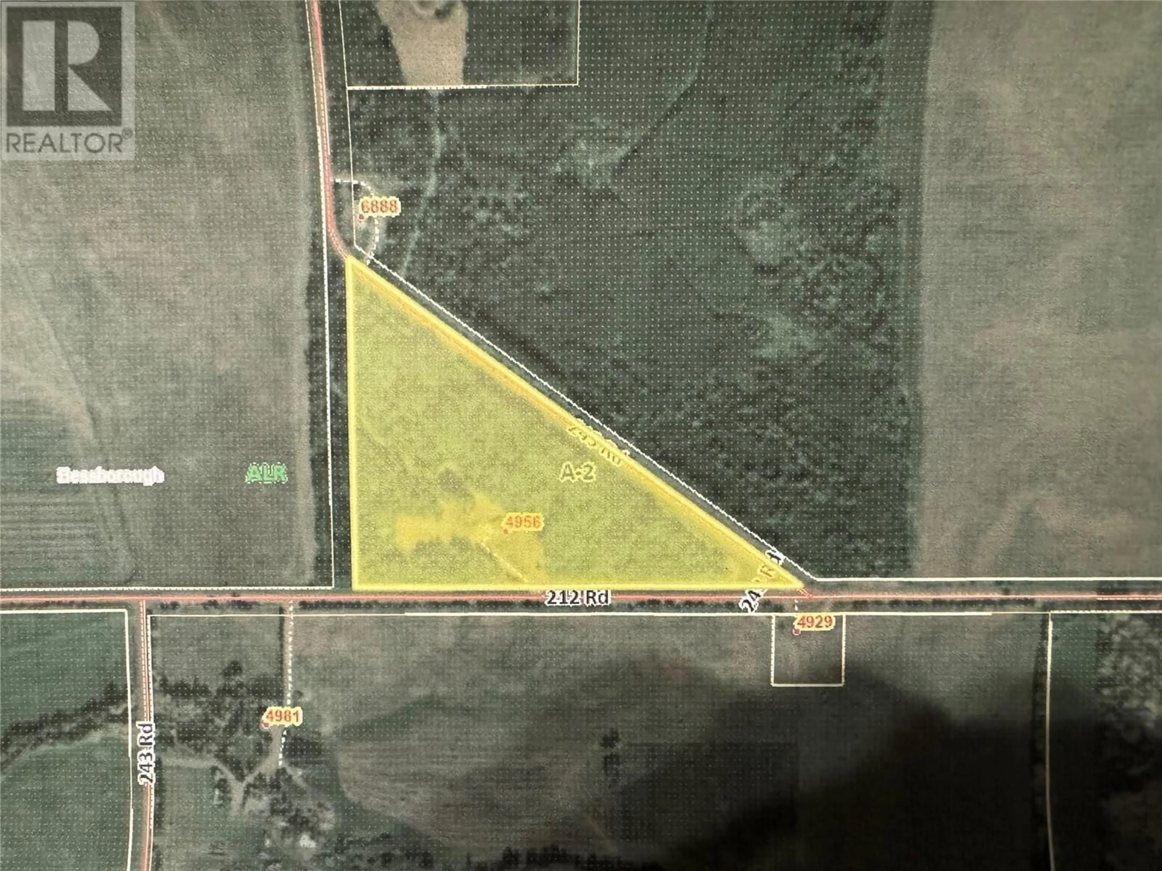 A pic from outside/outdoor area/front of a property/back of a property/a pic from drone, building for 4956 212 ROAD, Dawson Creek British Columbia V1G4E7